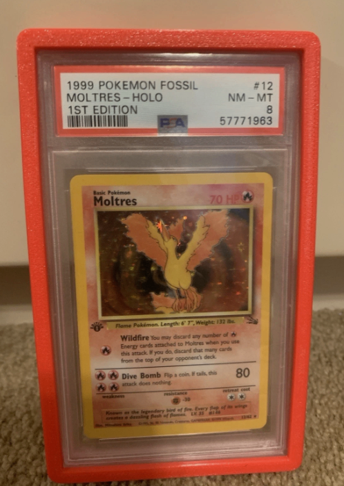 1999 Pokemon Fossil Moltres Holo 1st Edition PSA 8