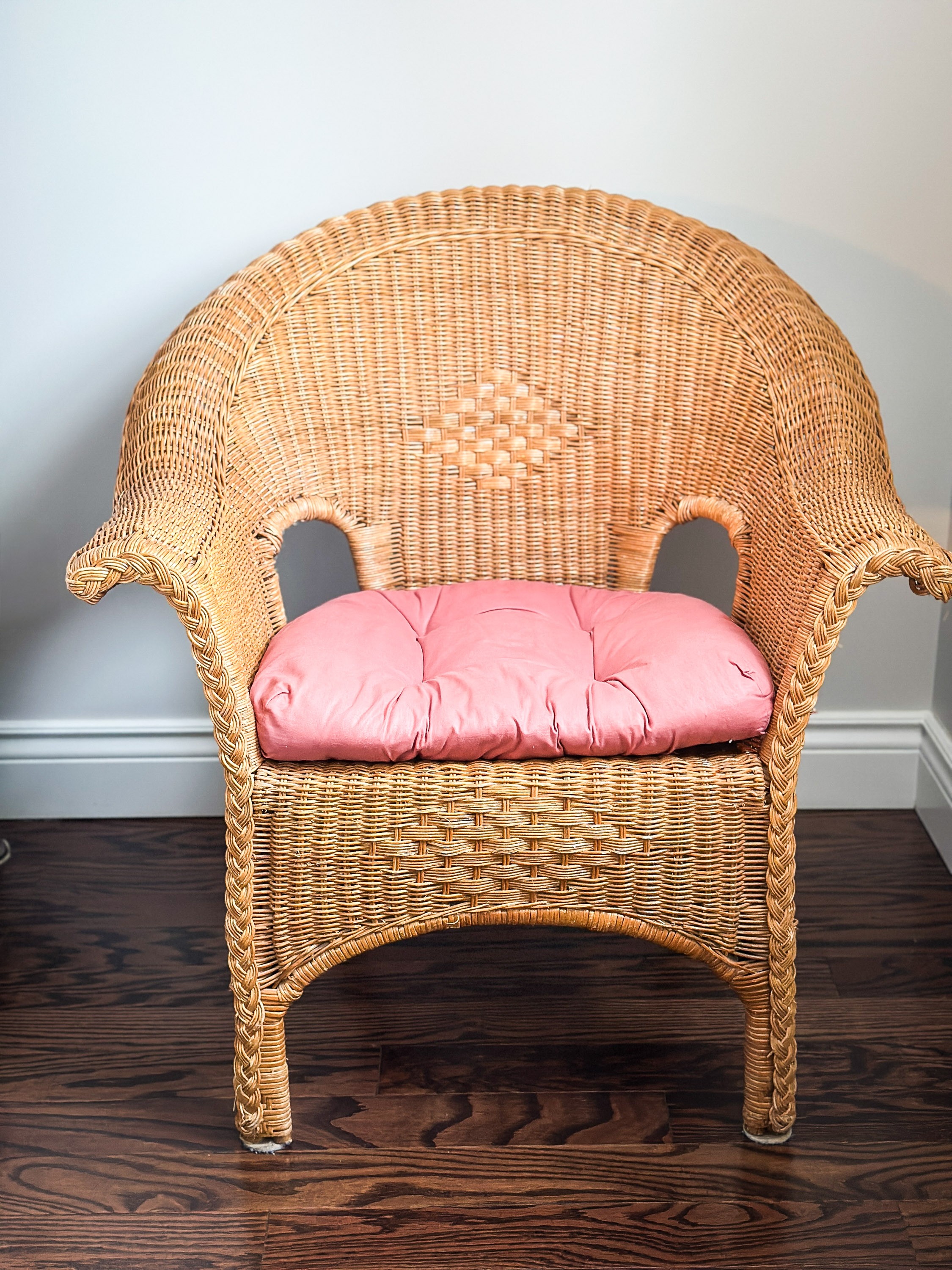 Wicker Chair with Pink Cushion