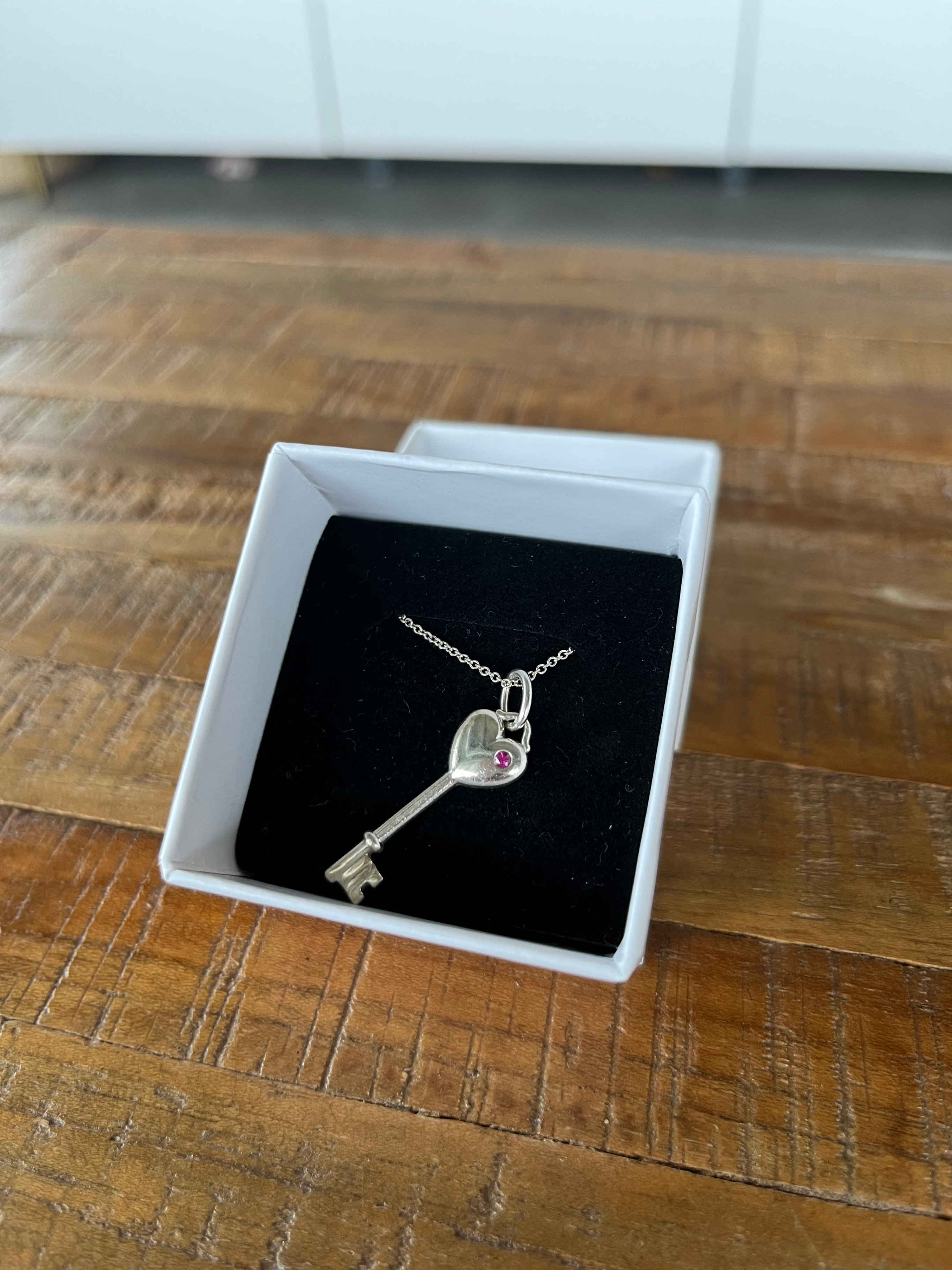 Tiffany & Co. 925 Silver Heart Key Pendant w/sapphire & chain