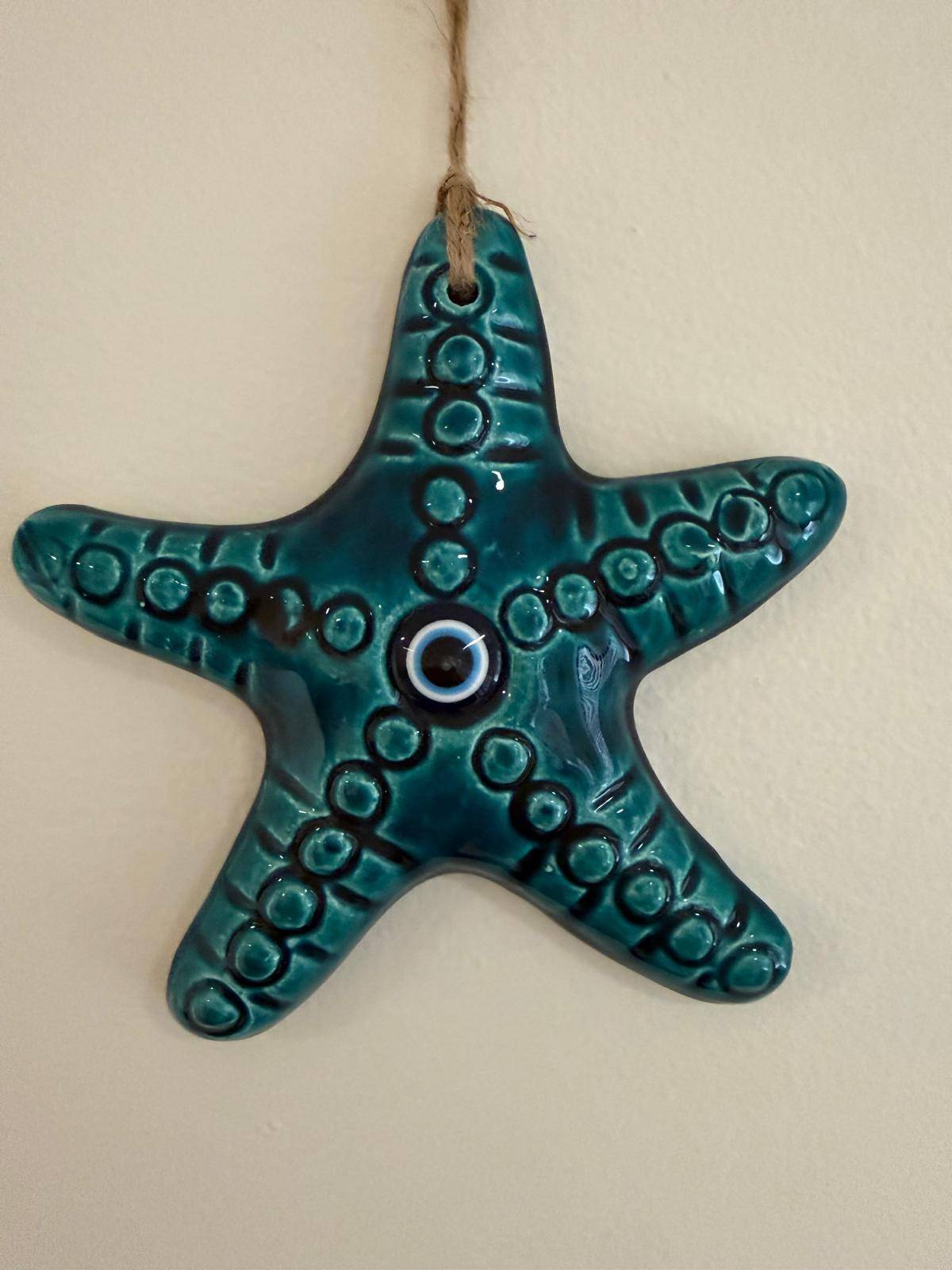 Sea star (starfish) and evil eye