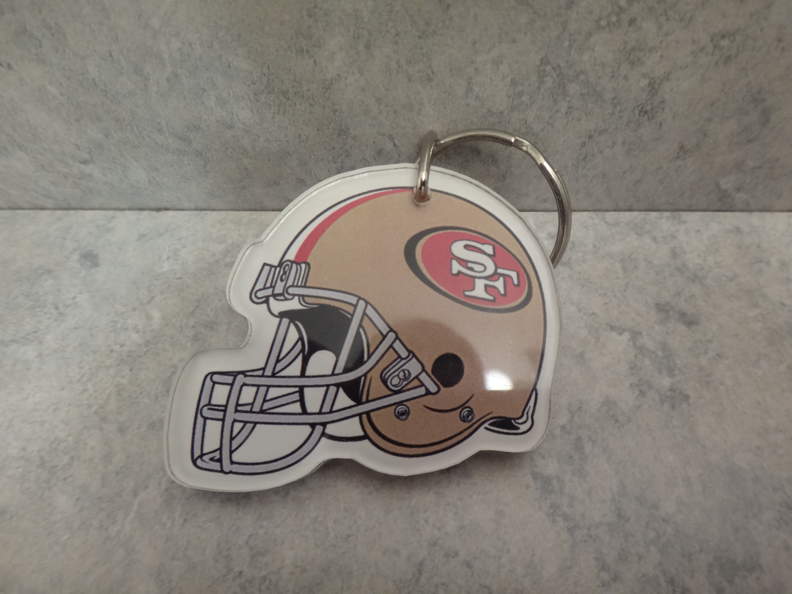 ✅♻️San Francisco 49ers BUD LIGHT NFL Helmet Plastic Keychain