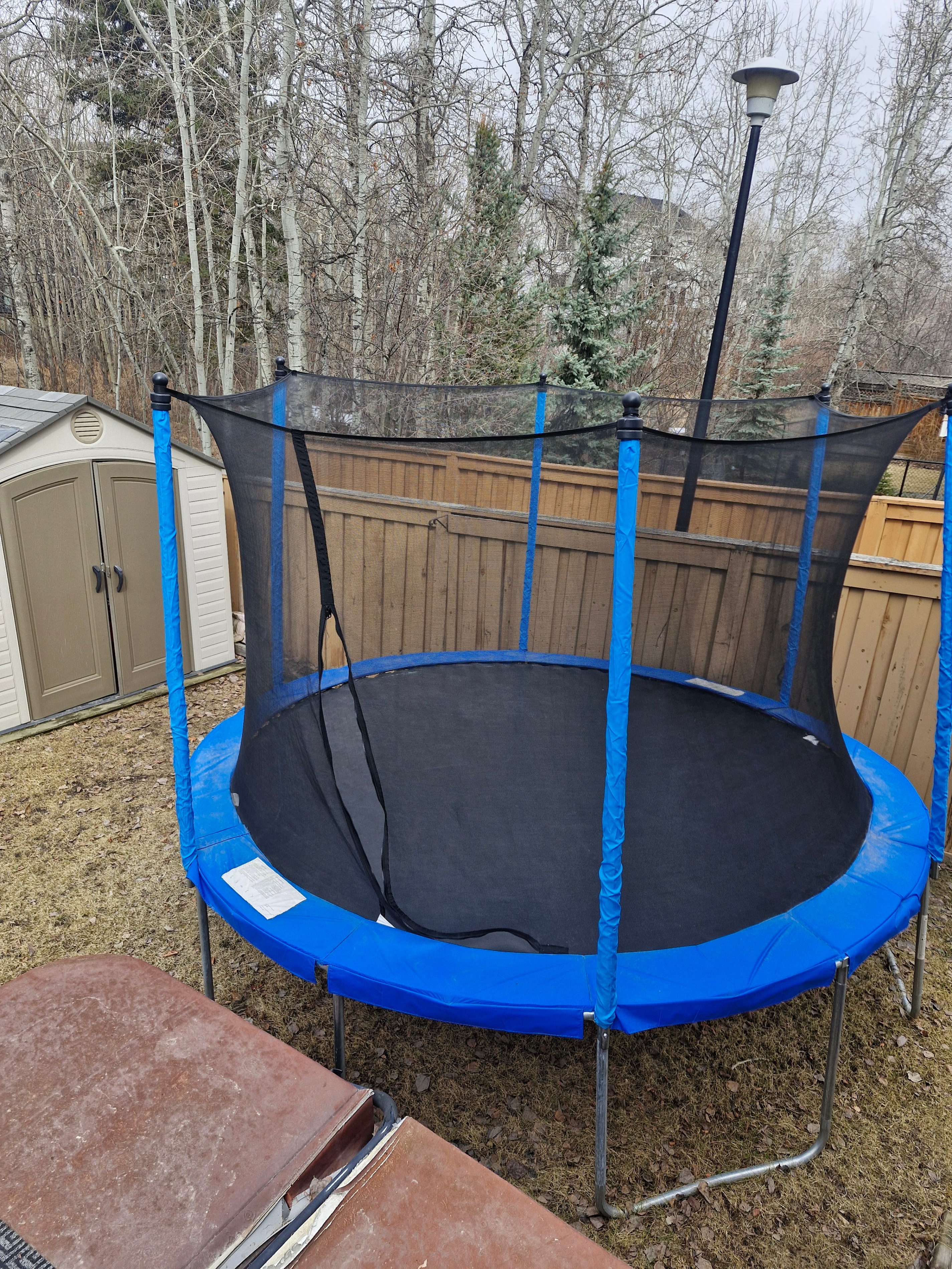 14ft Trampoline with Safety Net – Good Condition