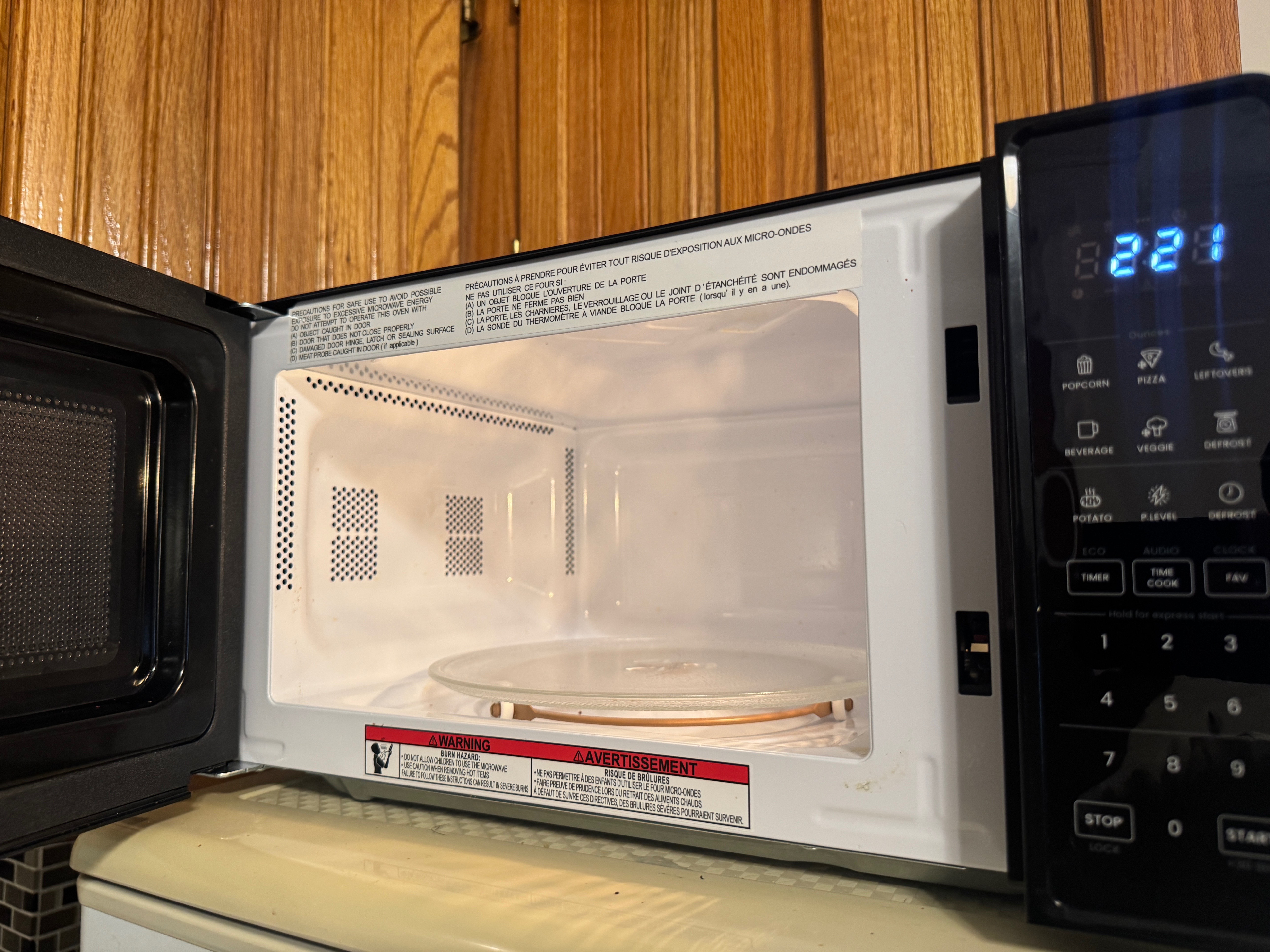 Chefman Countertop Microwave Oven 0.7 Cu. Ft. (Moving Sale) - photo 2