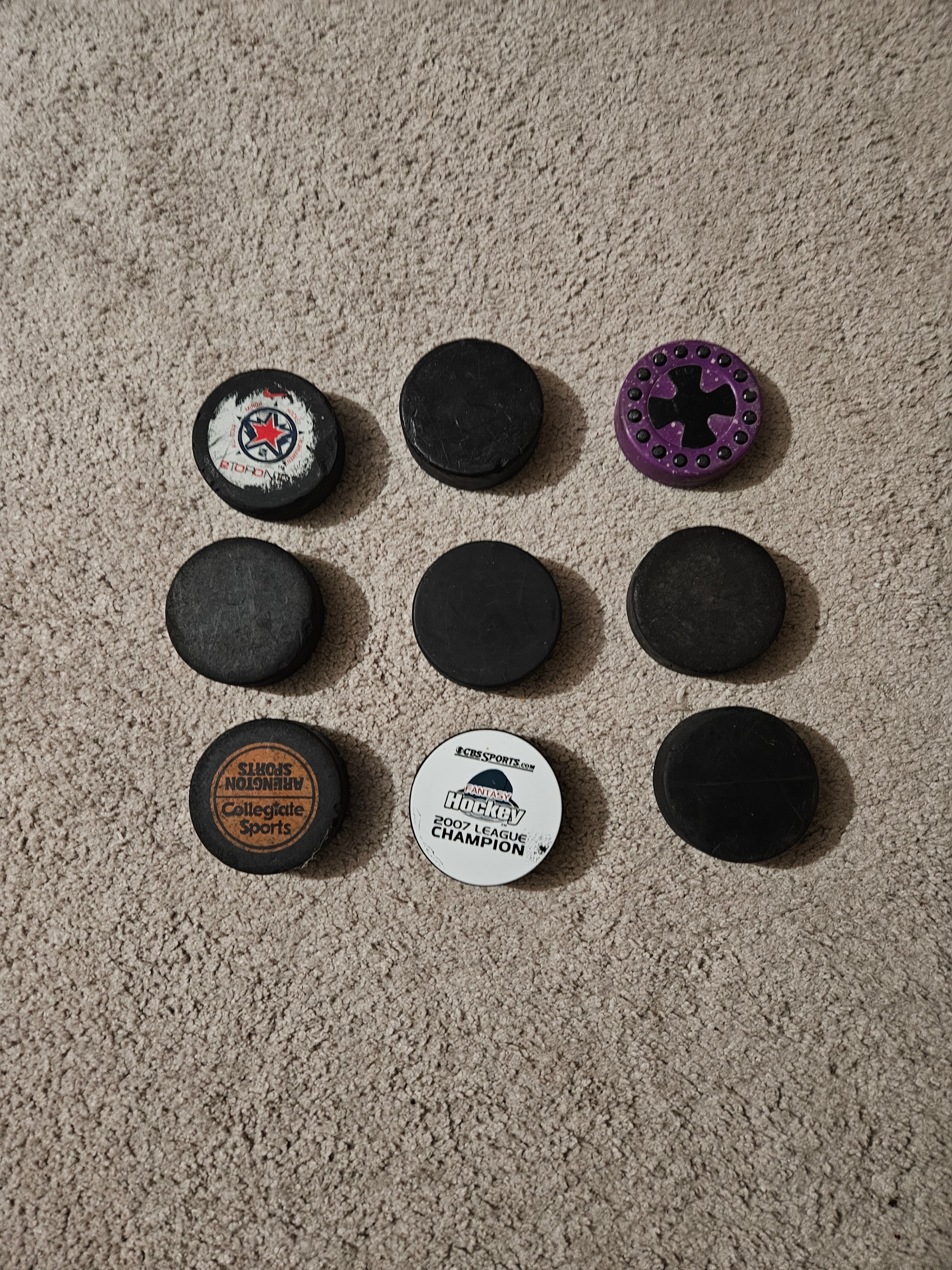 9 Hockey Pucks