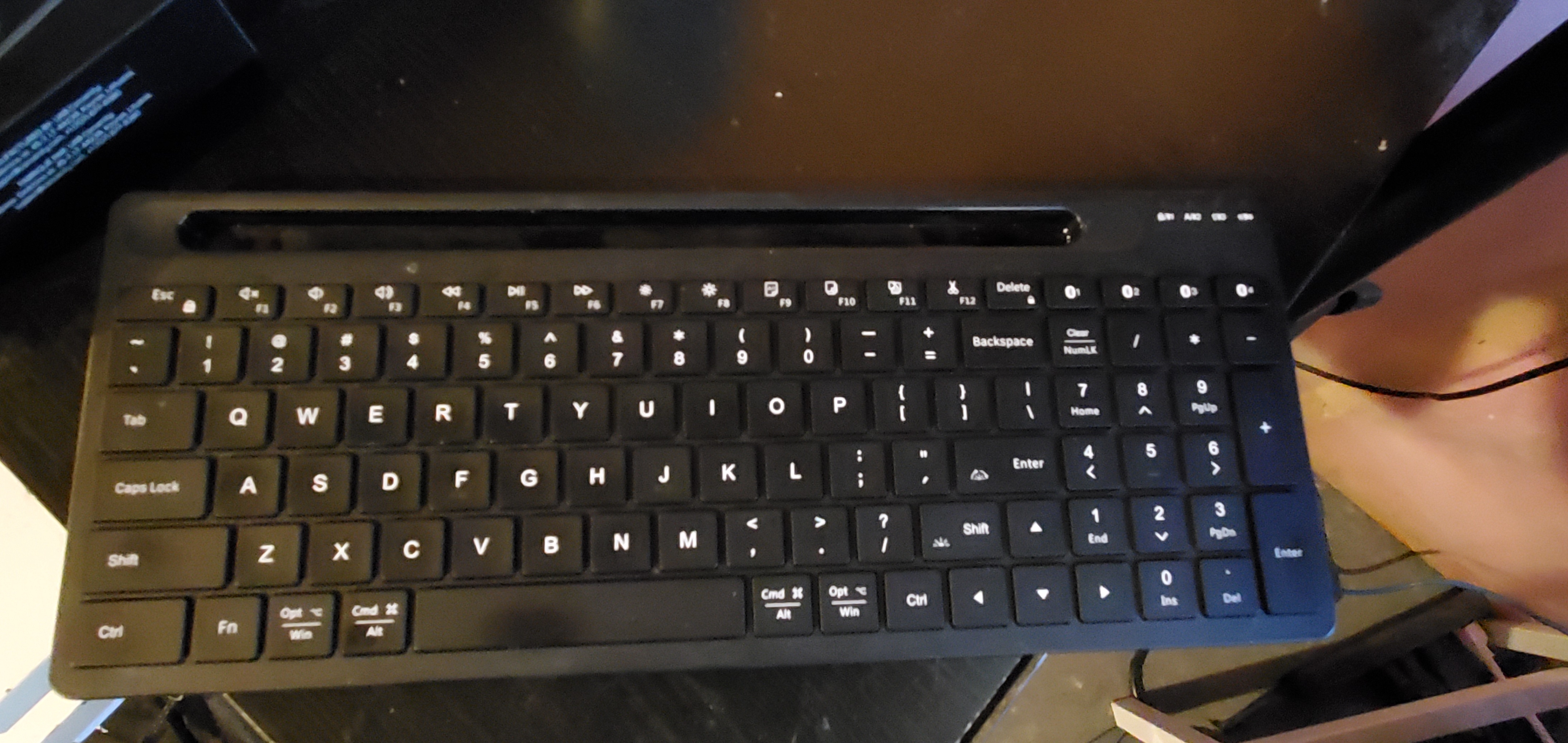 Bluetooth and Wireless keyboard w/ device holder - photo 3