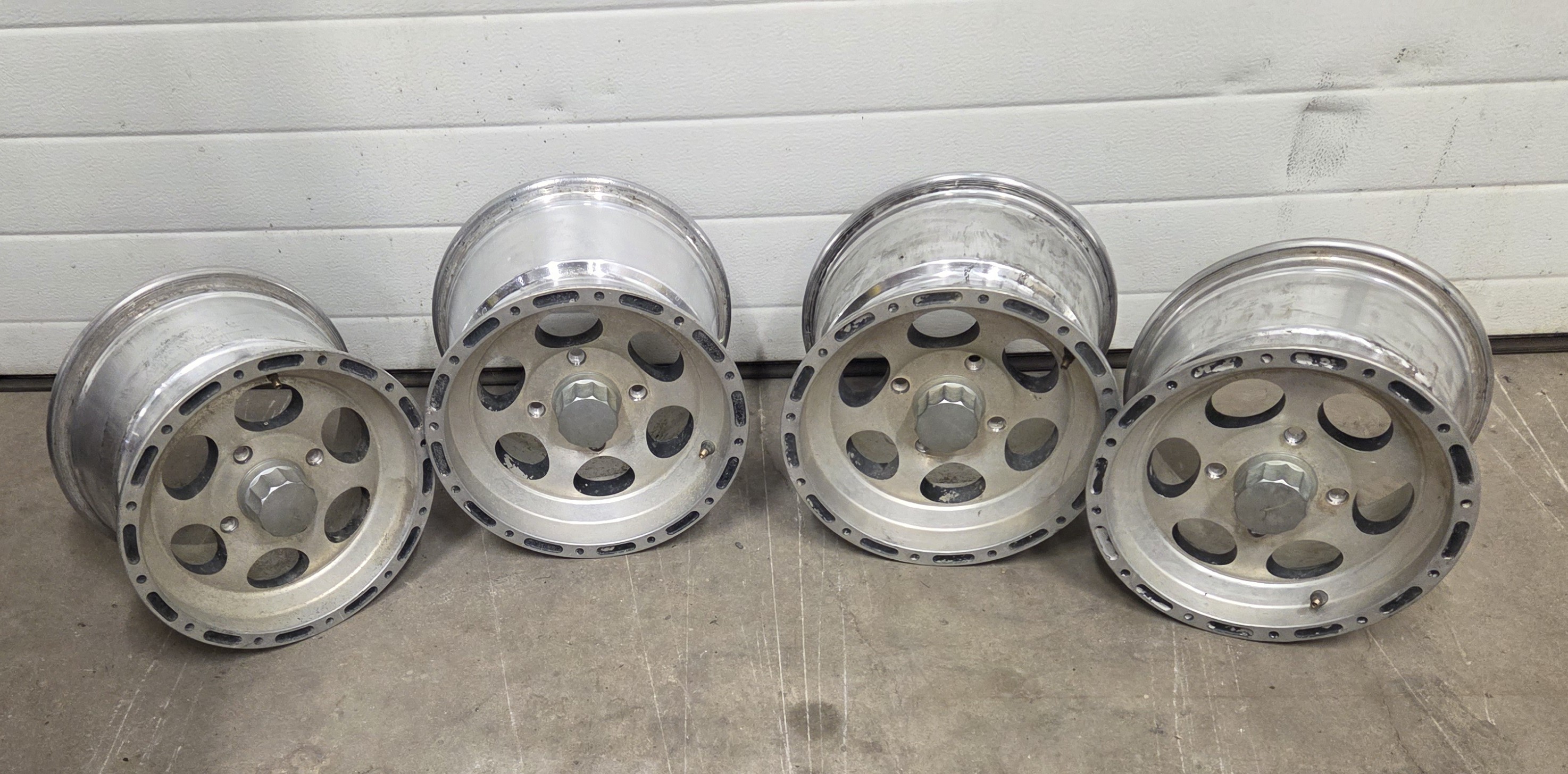SELLING 4 HIGH GRADE ALUMINUM RIMS WITH CENTER CAPS, 12" - photo 2