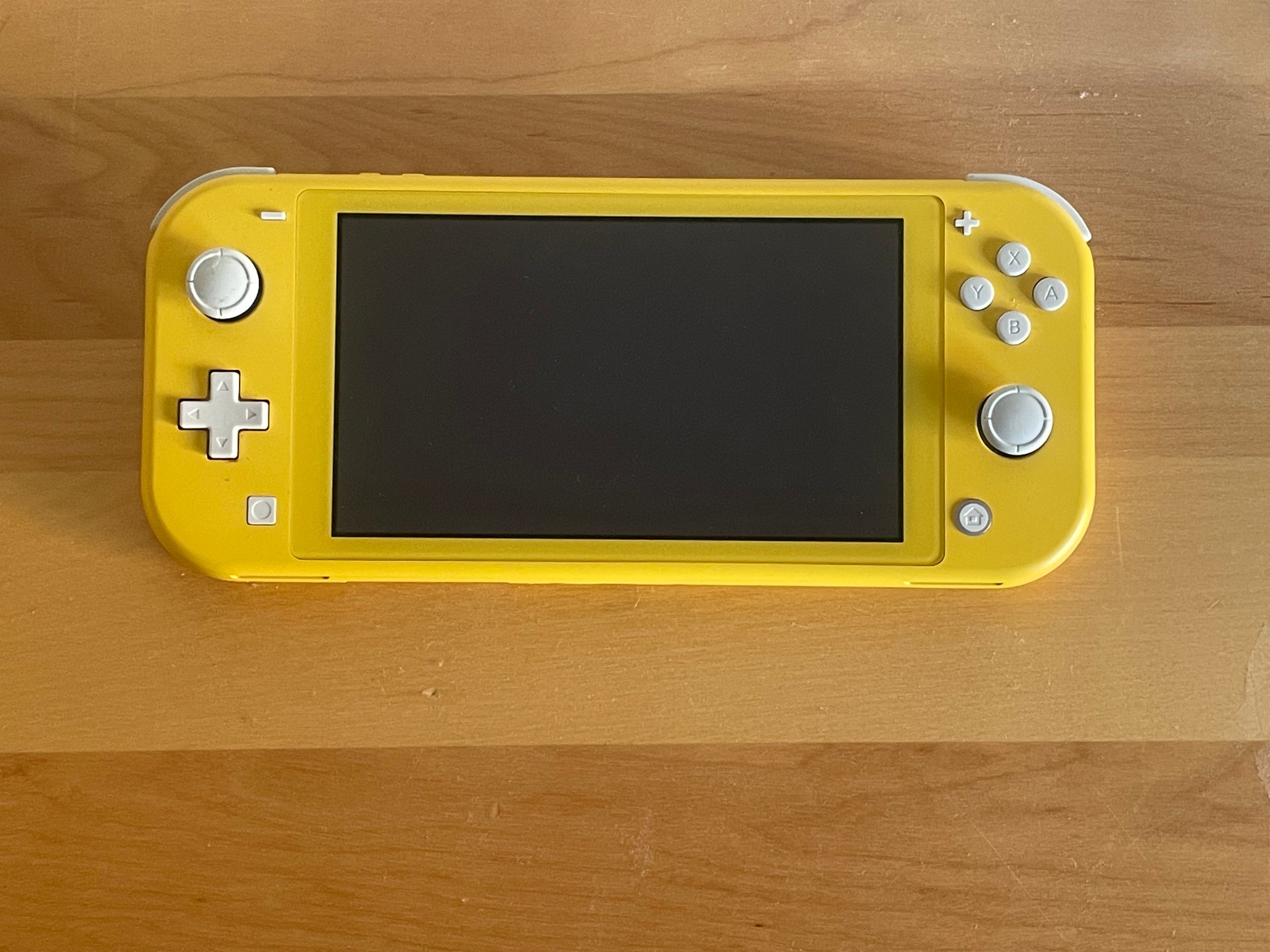 Nintendo Switch Lite Yellow (with charger)
