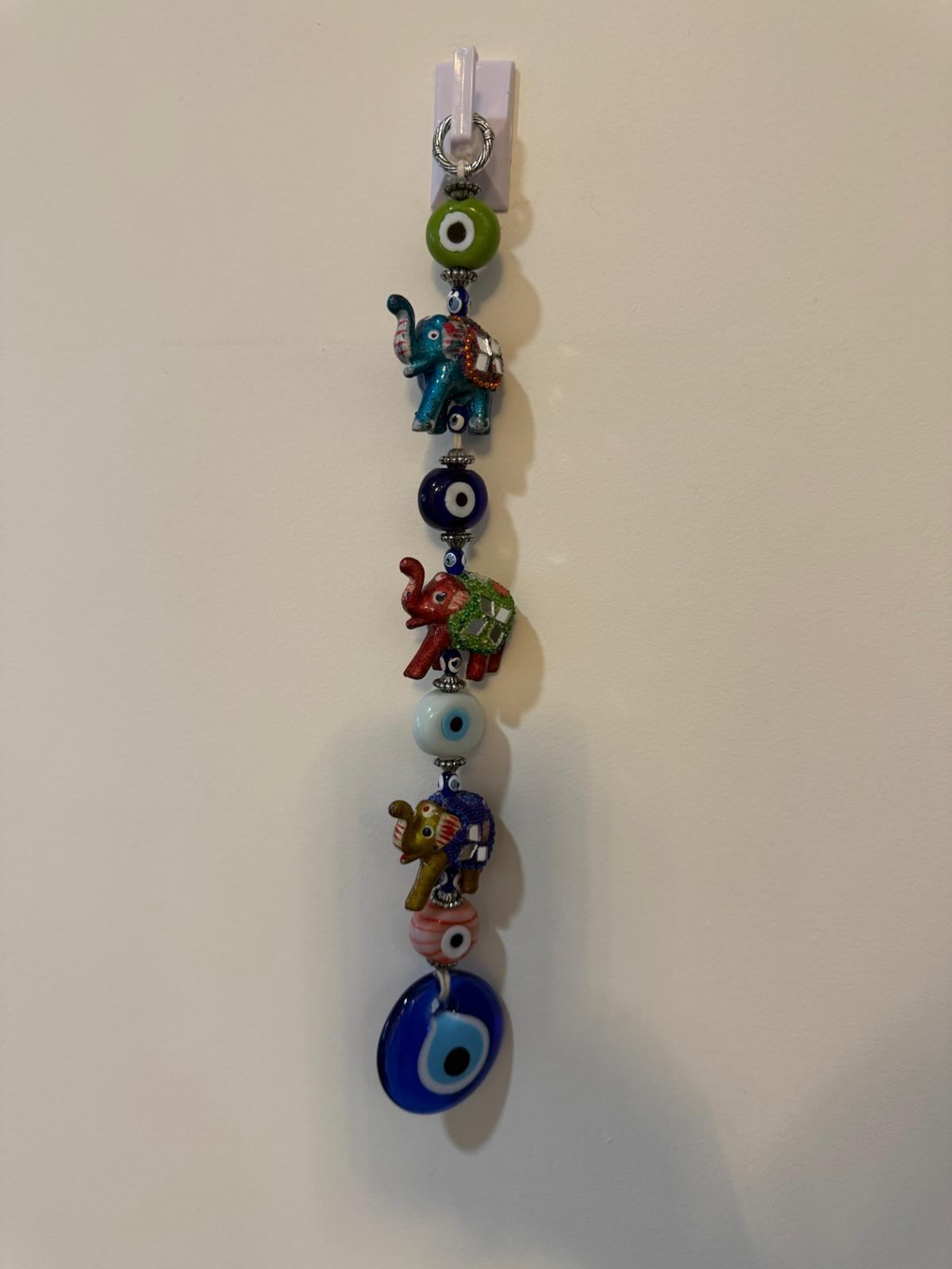 Elephant and evil eye wall hanging