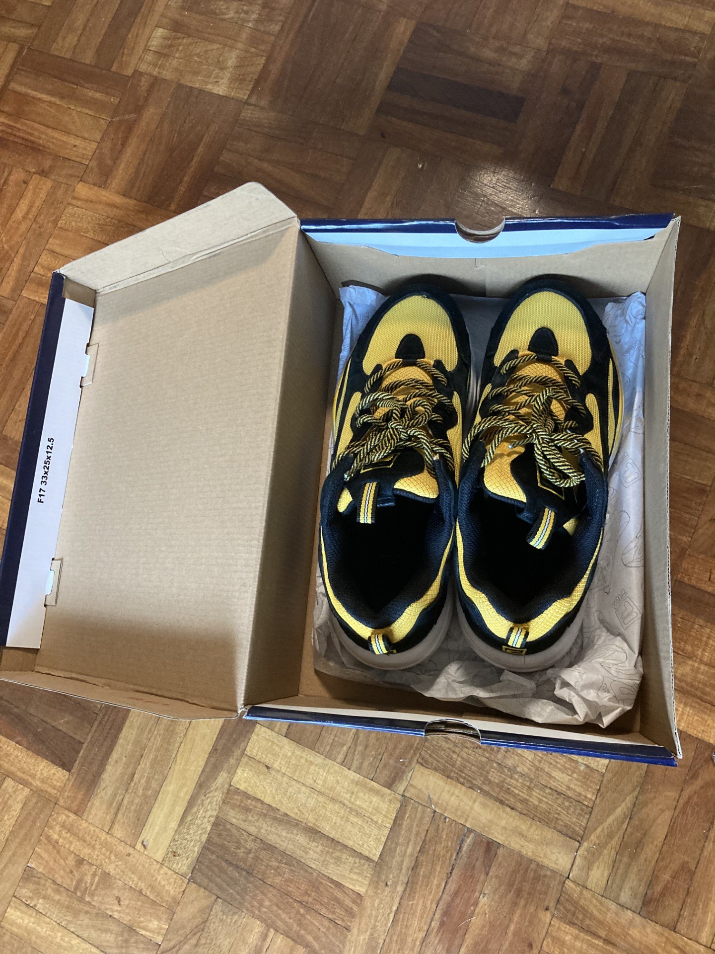 Yellow and black FILA Ray Tracer sneakers (Women's Size 9)
