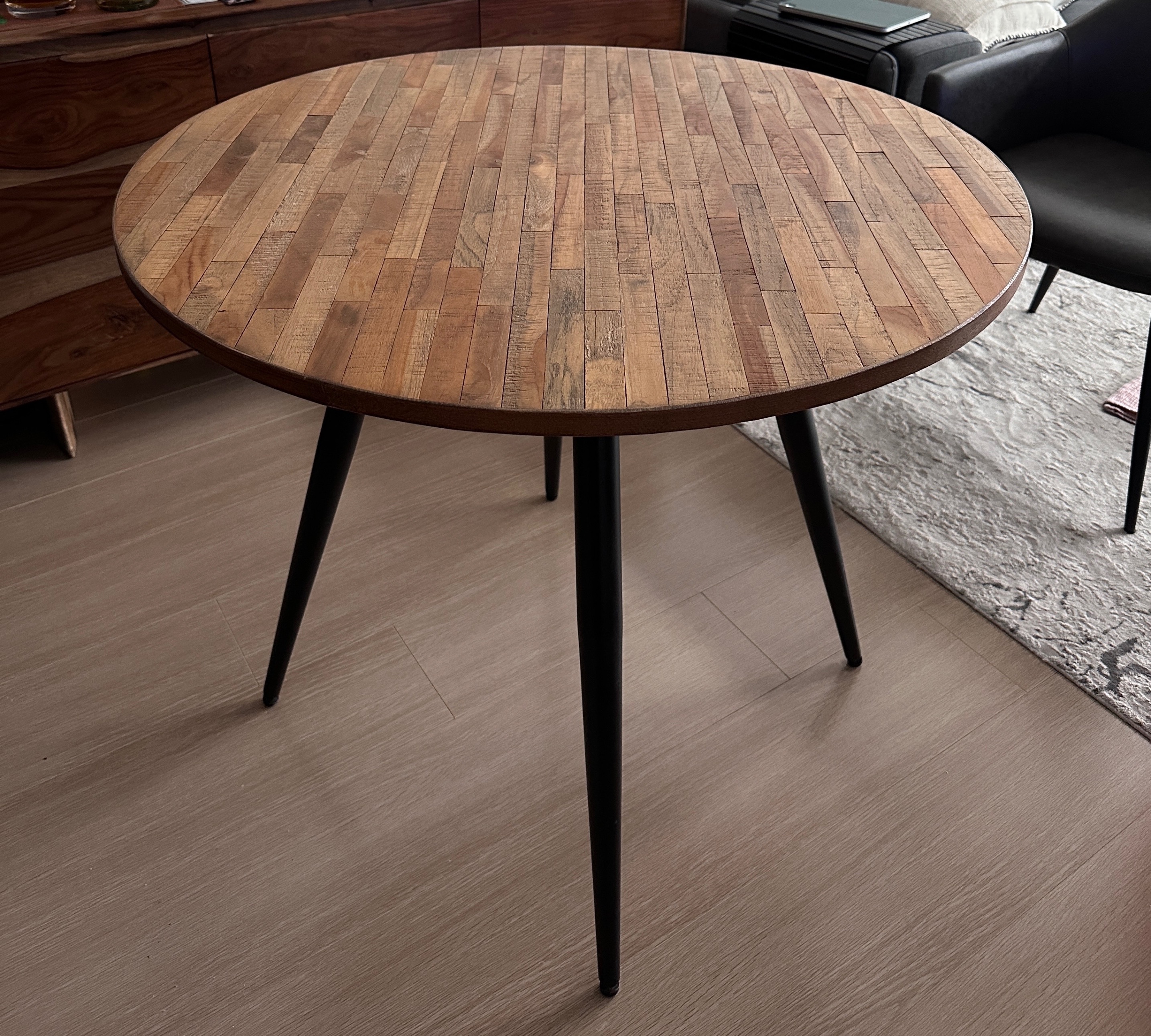 Round wooden dining table