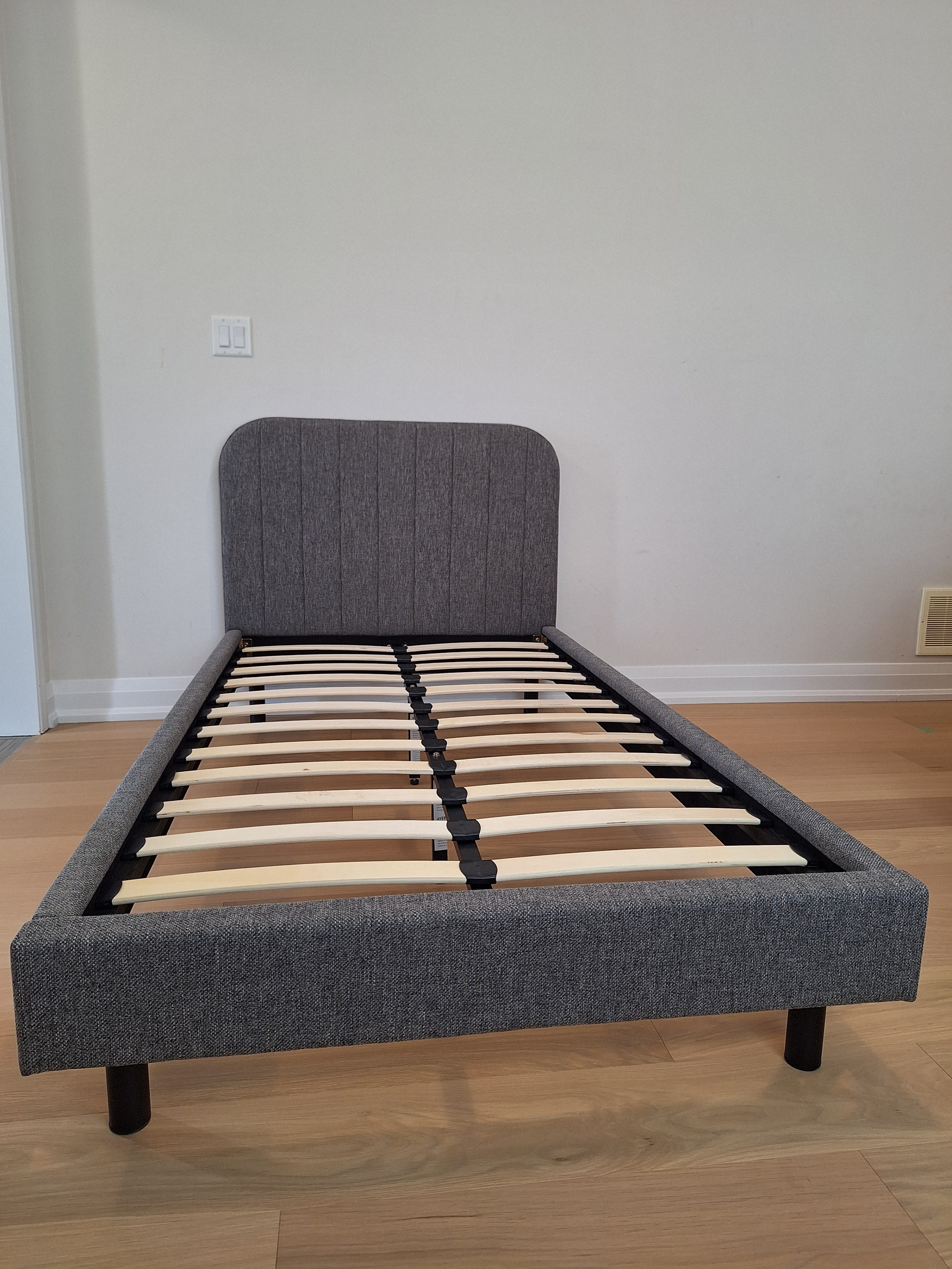 (Retail $400) Upholstered single/twin bed frame, like-new!