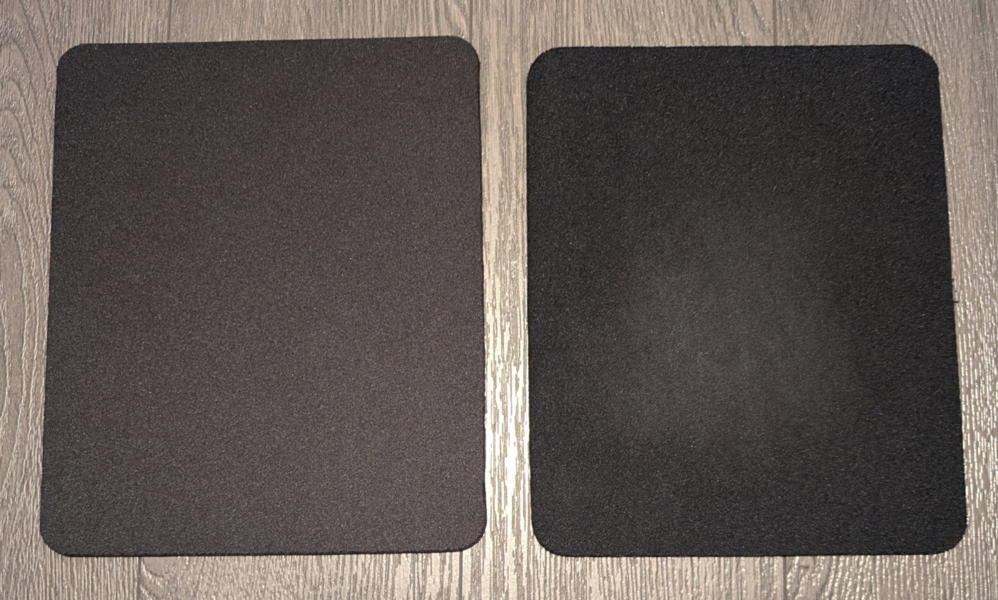 Black soft mouse pads (two)