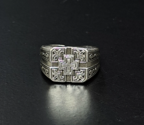 Silver tone ring with cross design