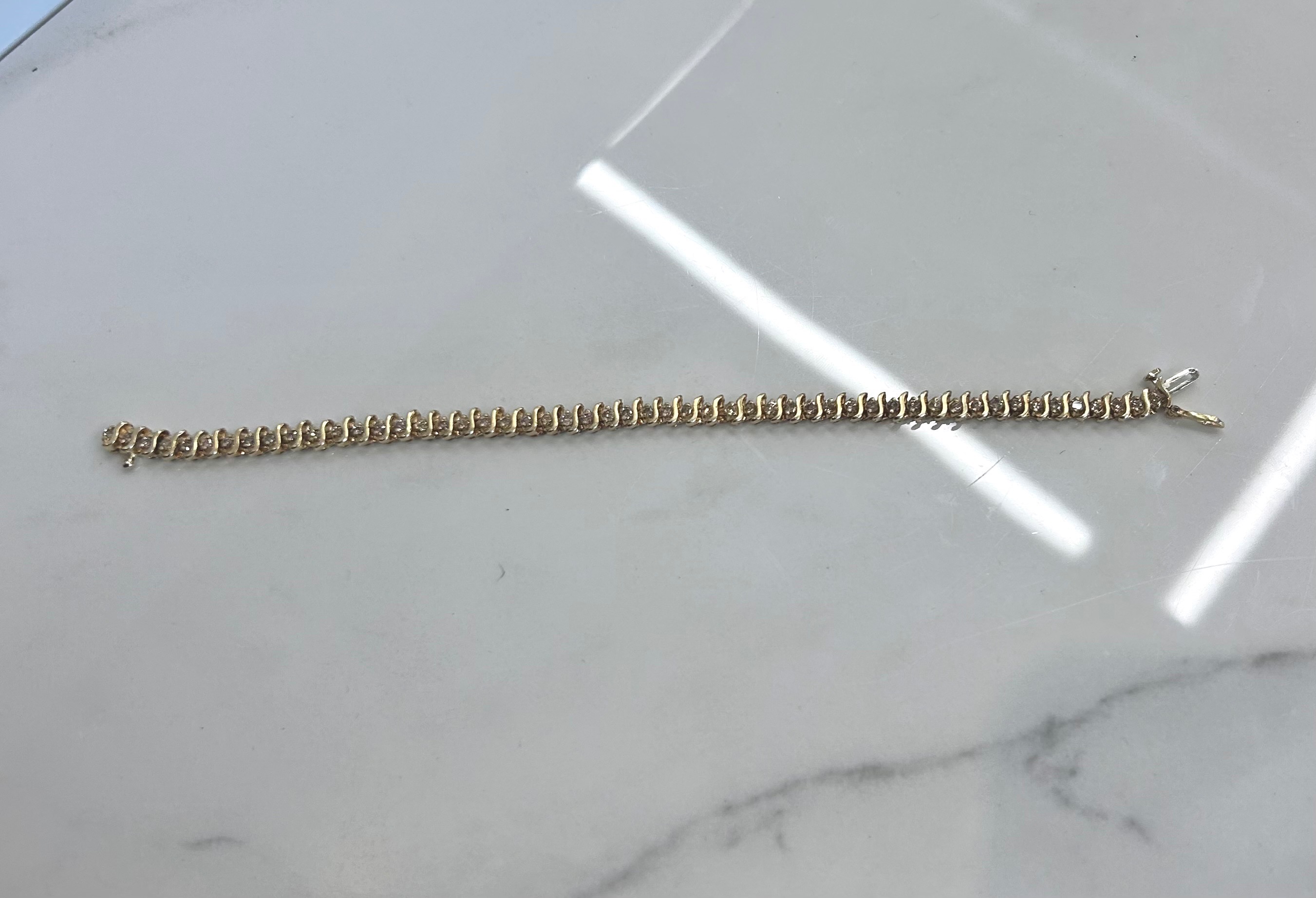 14K Gold bracelet - 15.1G - with Diamonds