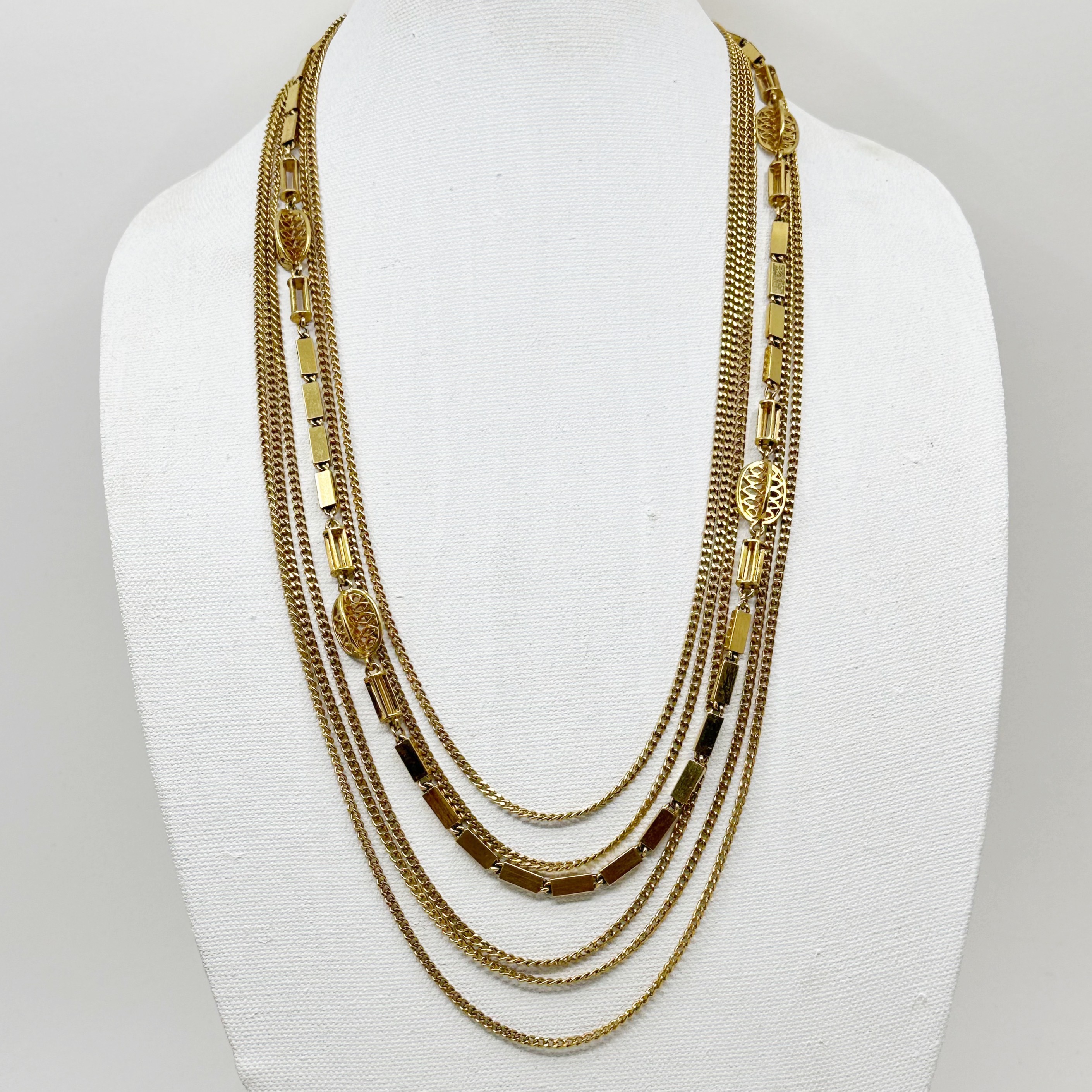 Monet Gold tone swirl bead multi strand necklace