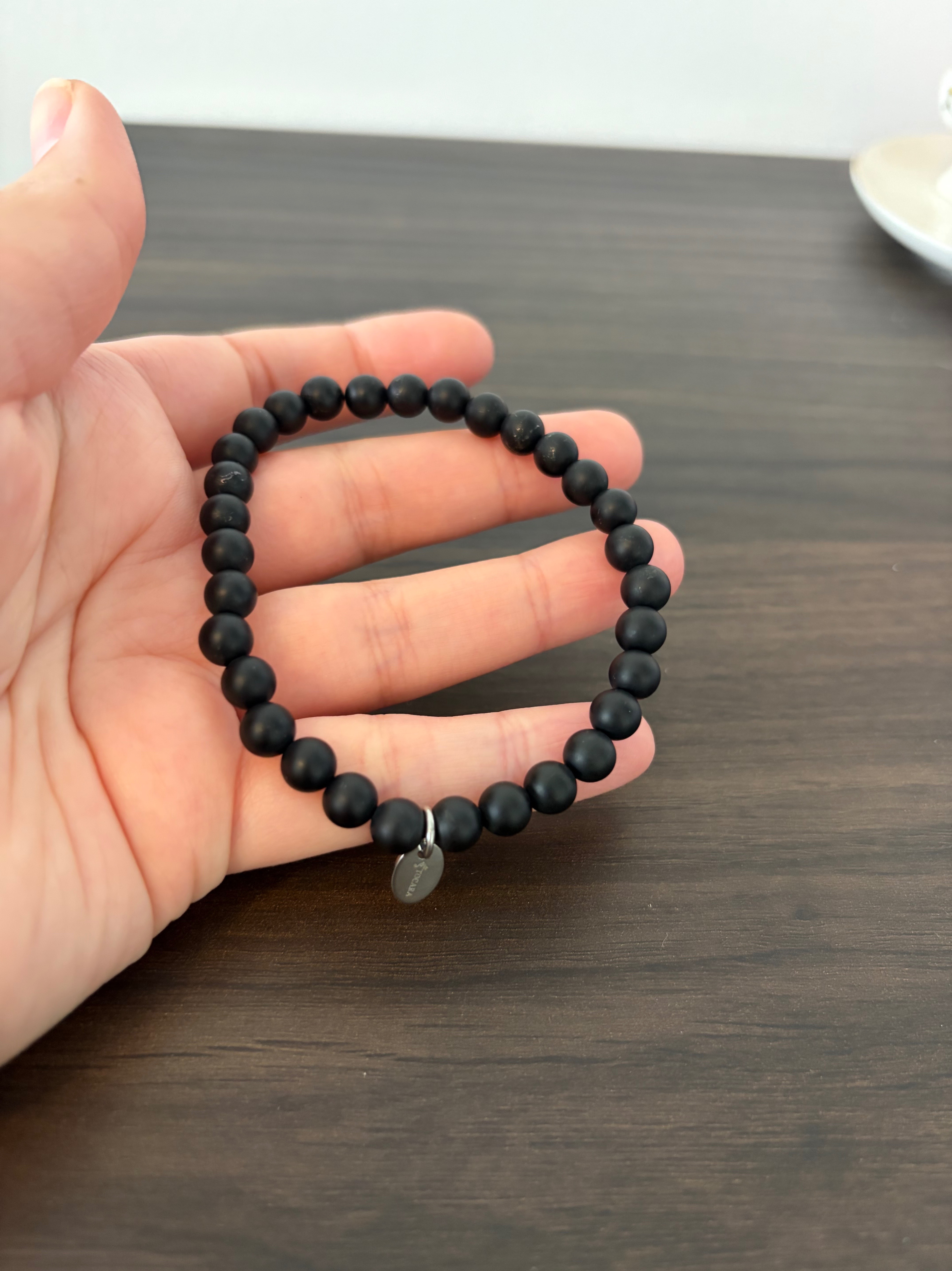 Tocara matte black bead bracelet with a oval charm tag - photo 3