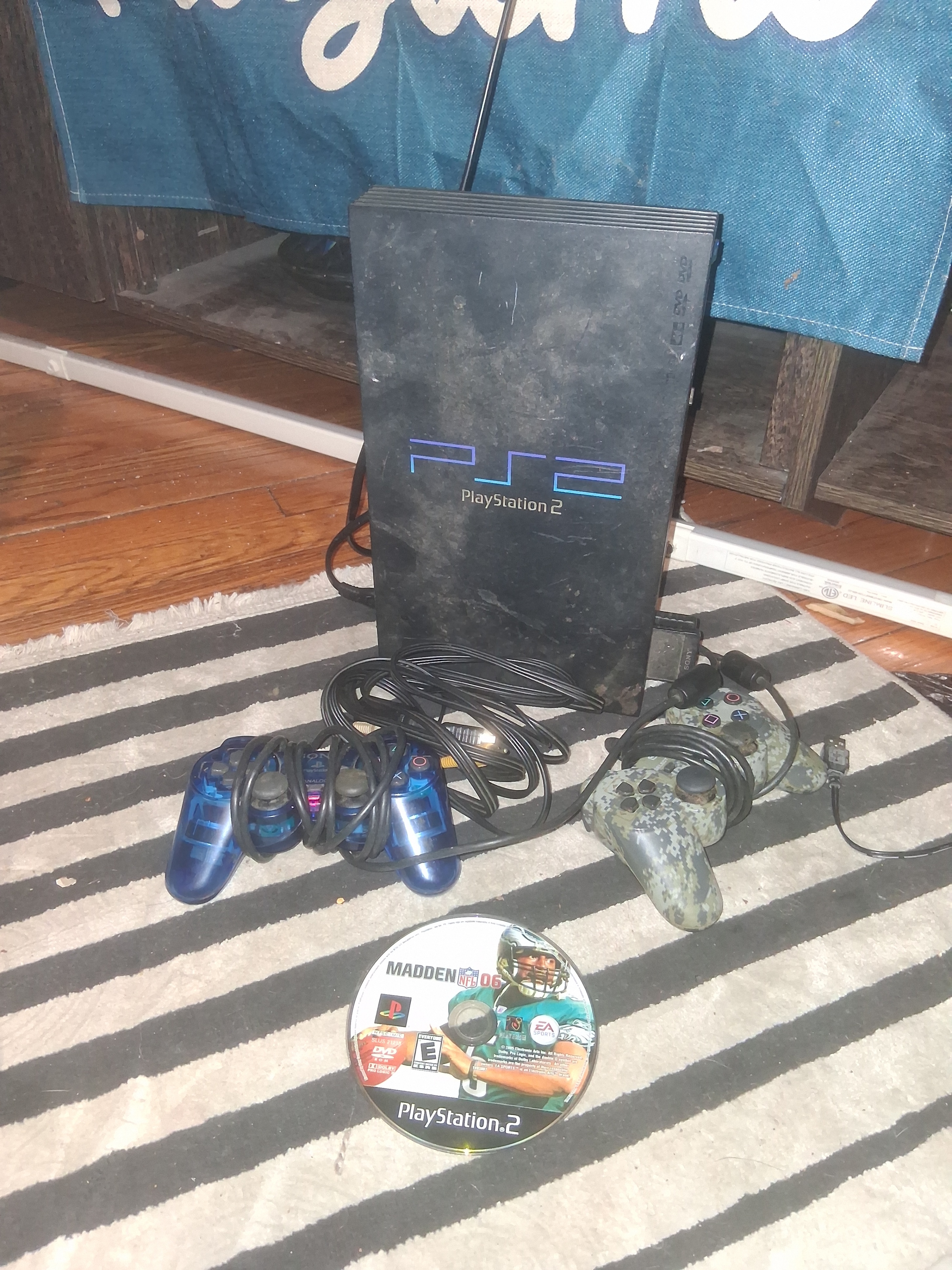 Sony PlayStation 2 Console with Controllers and Madden NFL 06