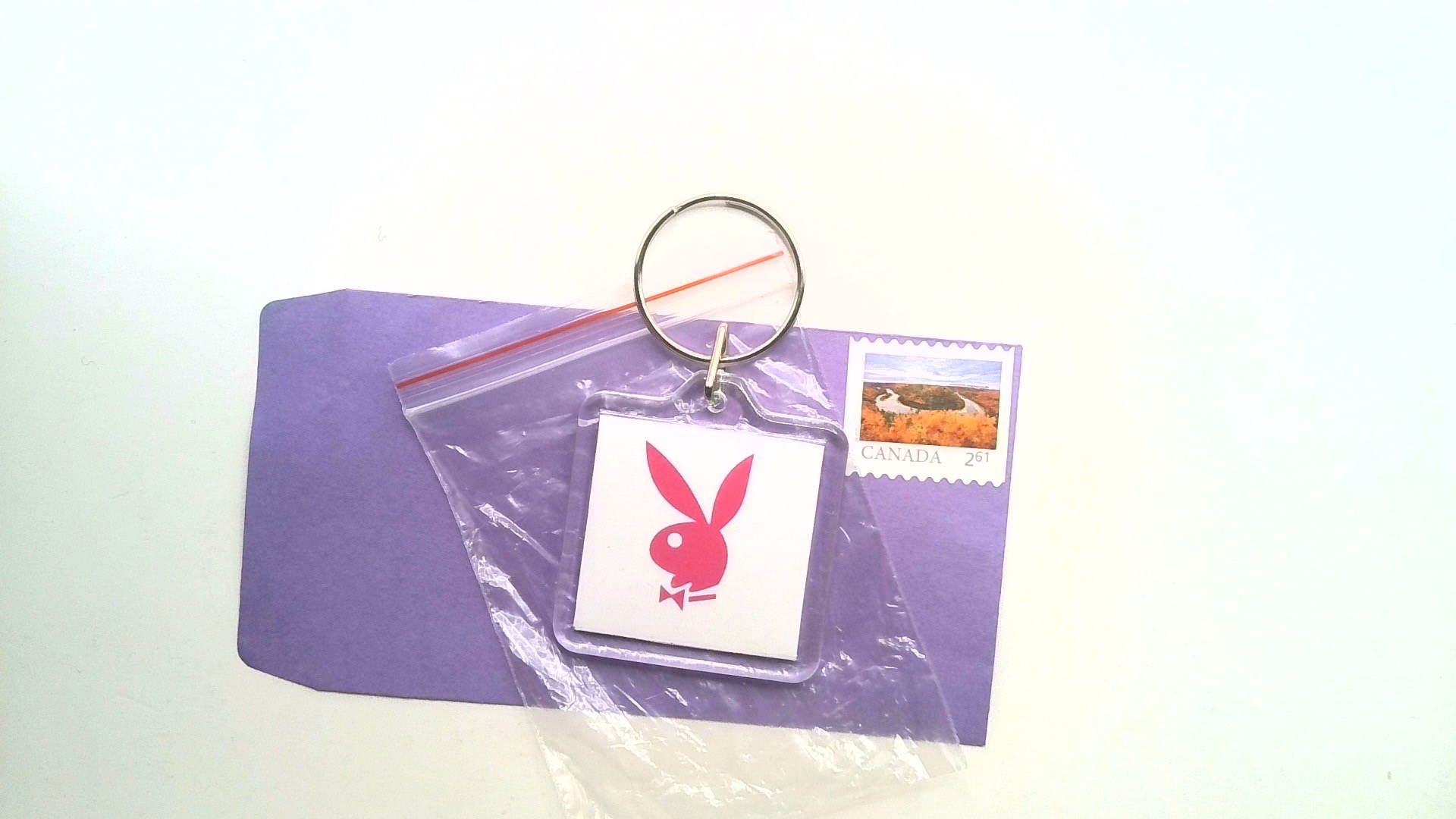 PLAY BOY ( KEY CHAIN ) FREE SHIPPING