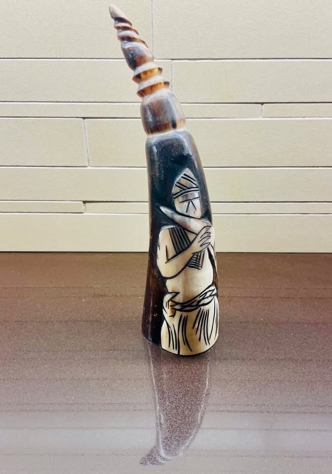 Hand-Carved African Horn Sculpture – Tribal Figure