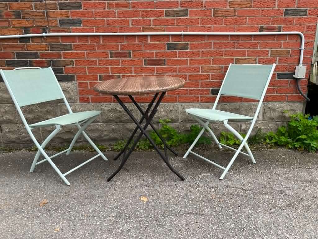 Round Wicker Patio Table with Two Folding Chairs