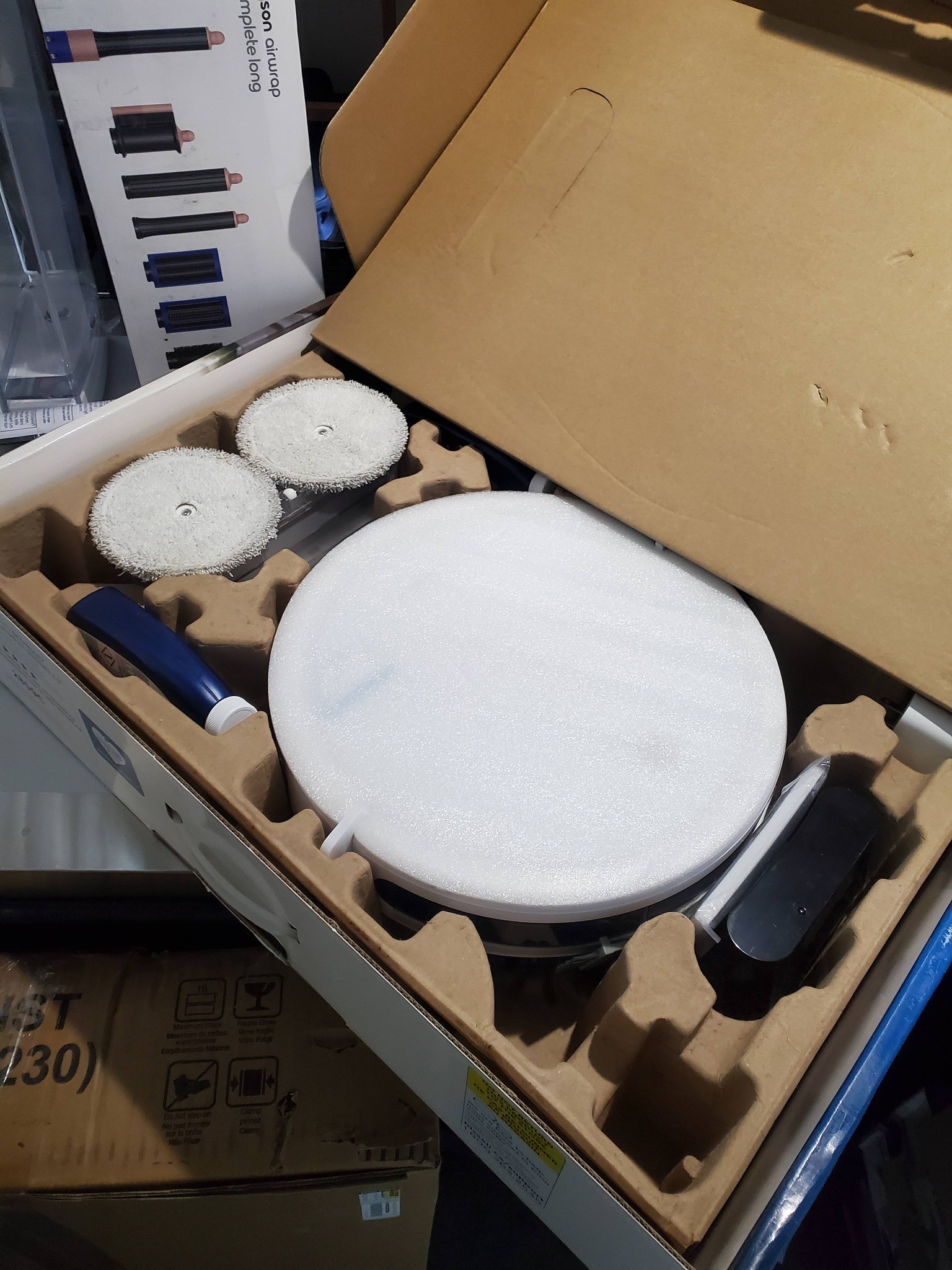 BISSELL SpinWave® Robot Vacuum & Mop – 2‑in‑1 - photo 4