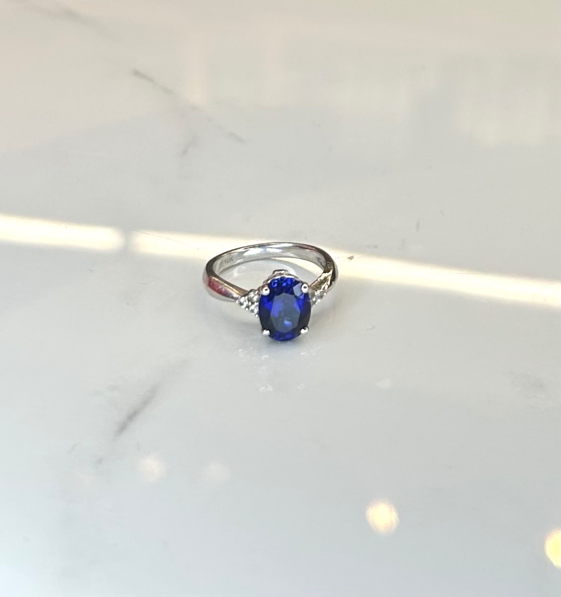 10K White Gold Ring W/ Blue Stone - 2.90G - Size 5