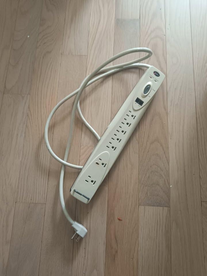 7-Outlet Surge Protector Power Strip with Phone Protection