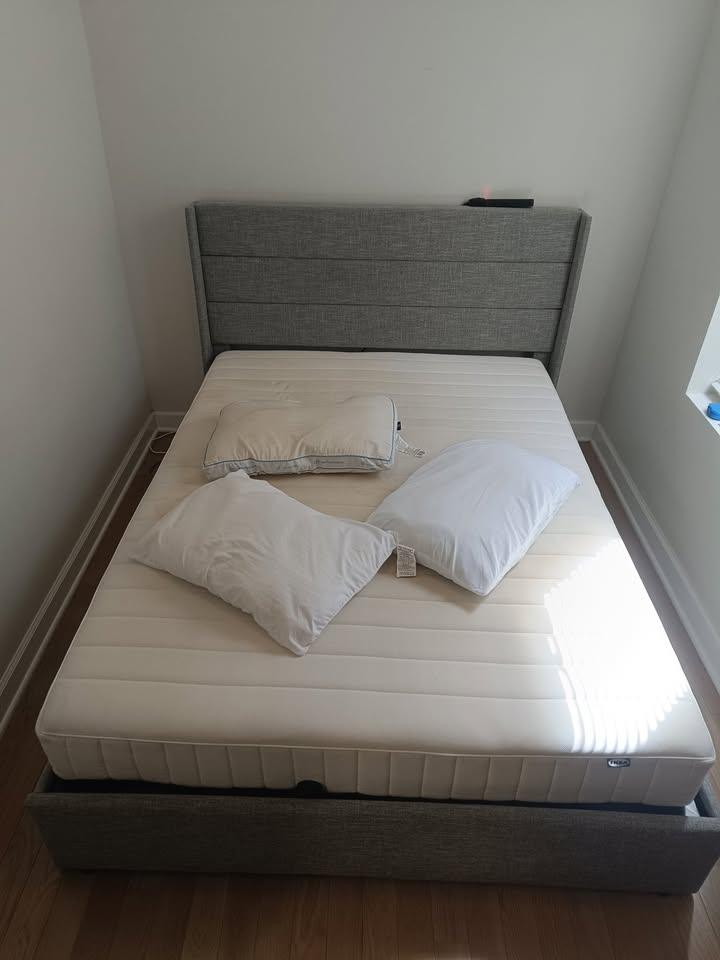 IKEA Queen Mattress and Gray Upholstered Bed Frame