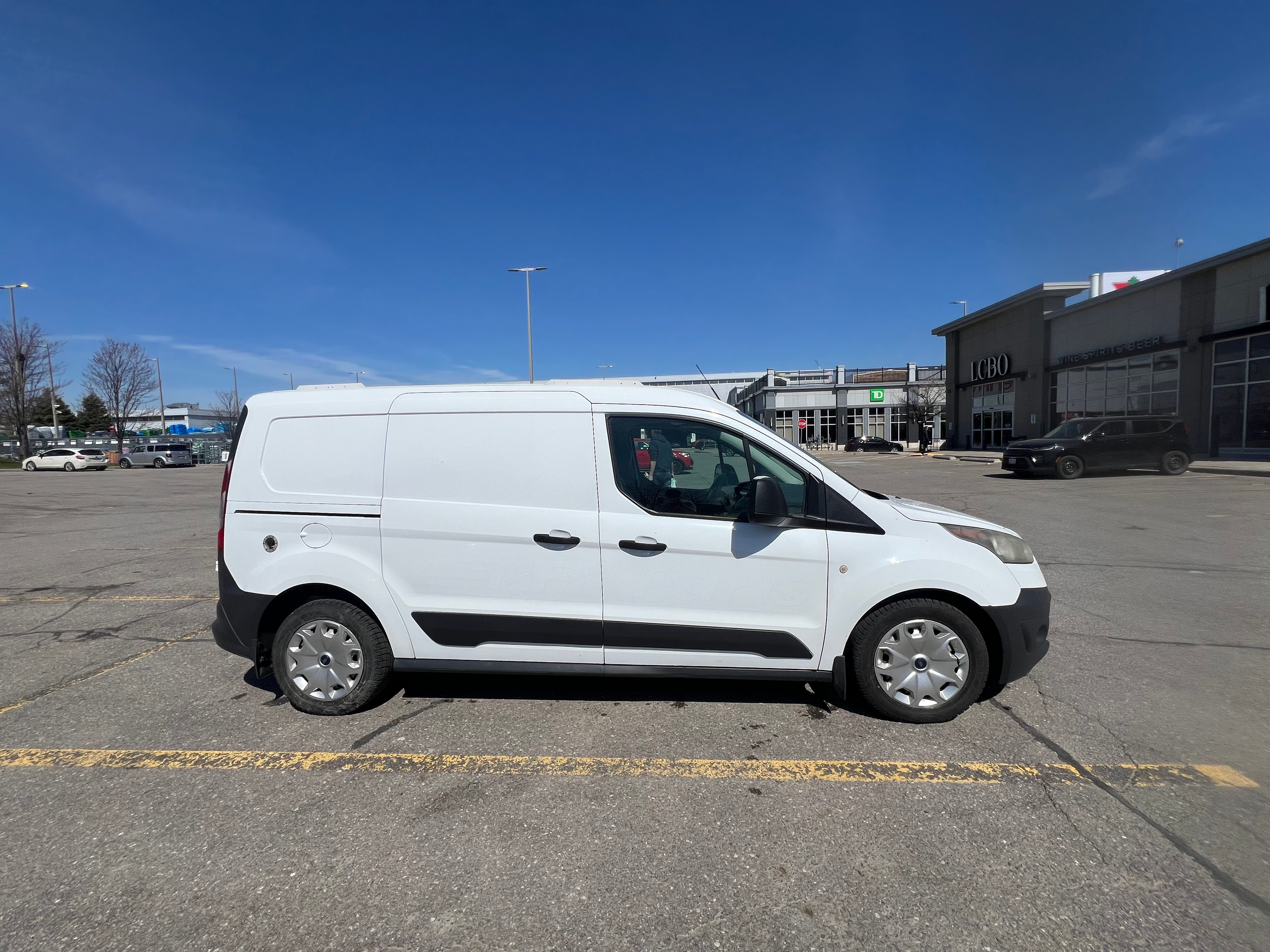 White Ford Transit Connect Cargo Van