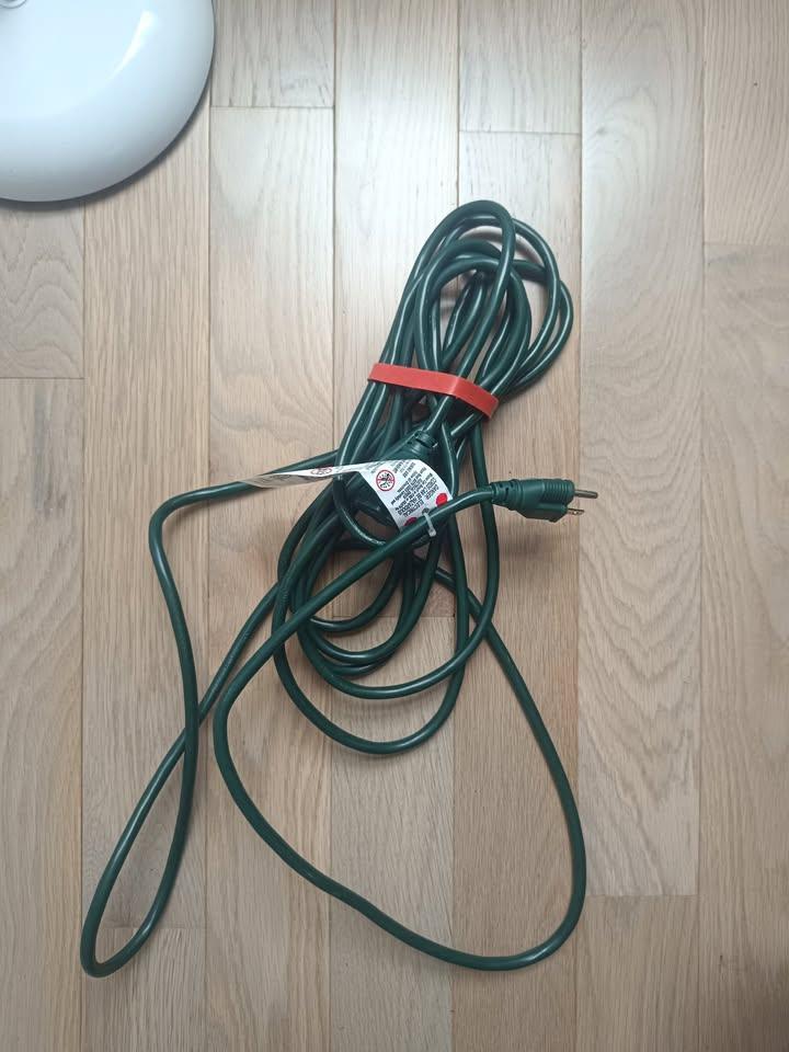 Green Outdoor Extension Cord with Multiple Outlets