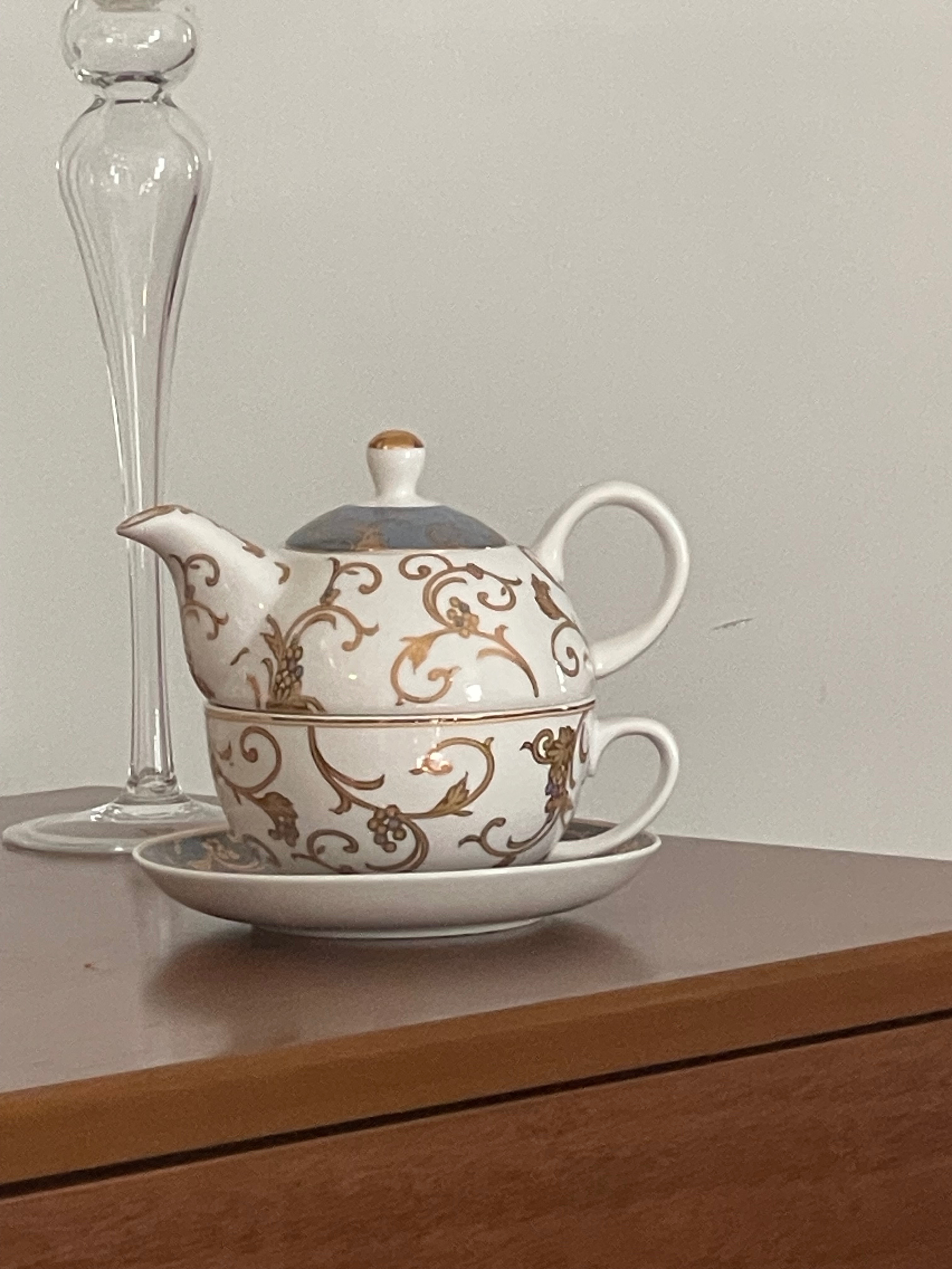 Teapot and teacup set with saucer