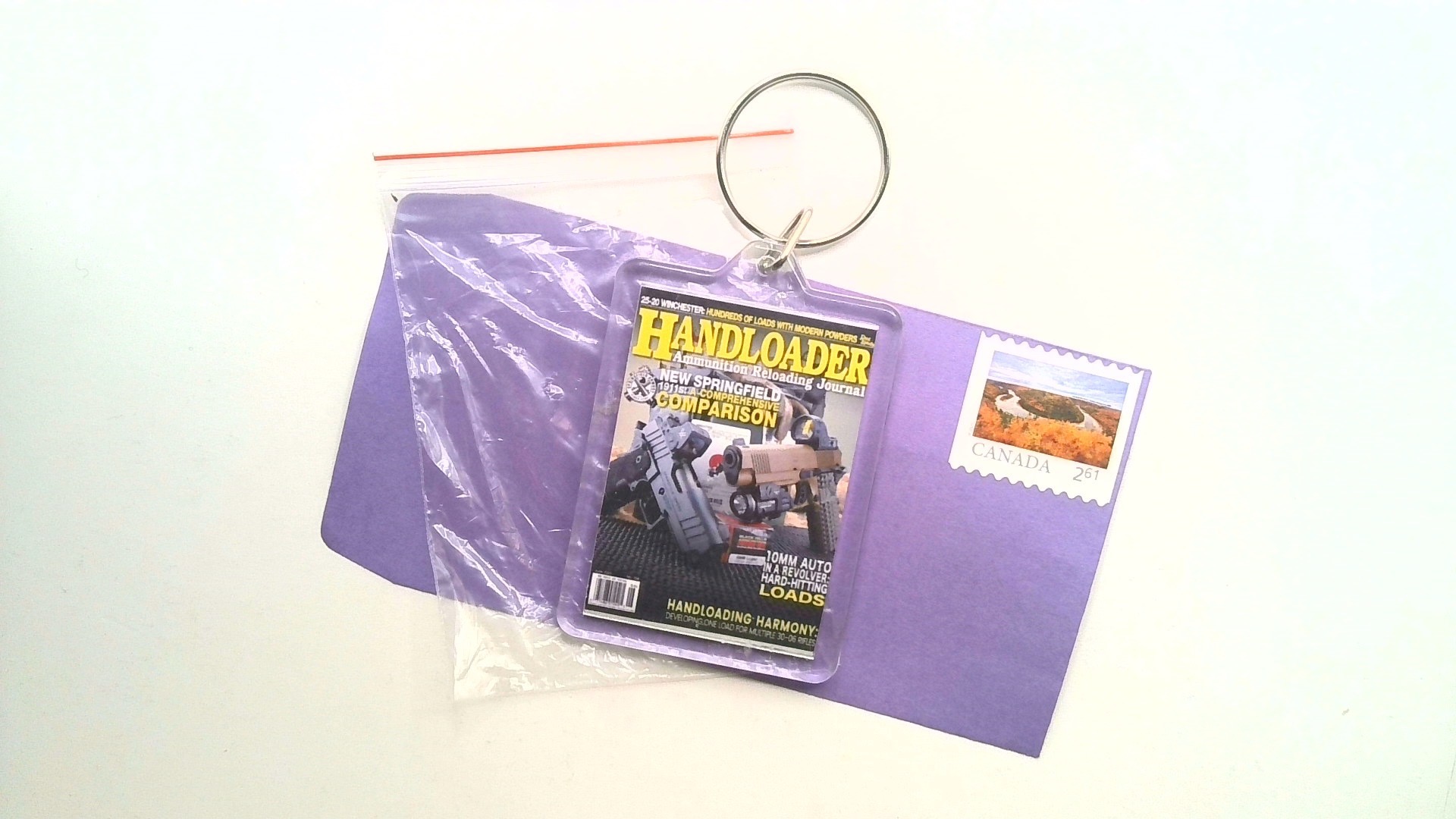 HANDLOADER ( MAGAZINE KEY CHAIN ) FREE SHIPPING