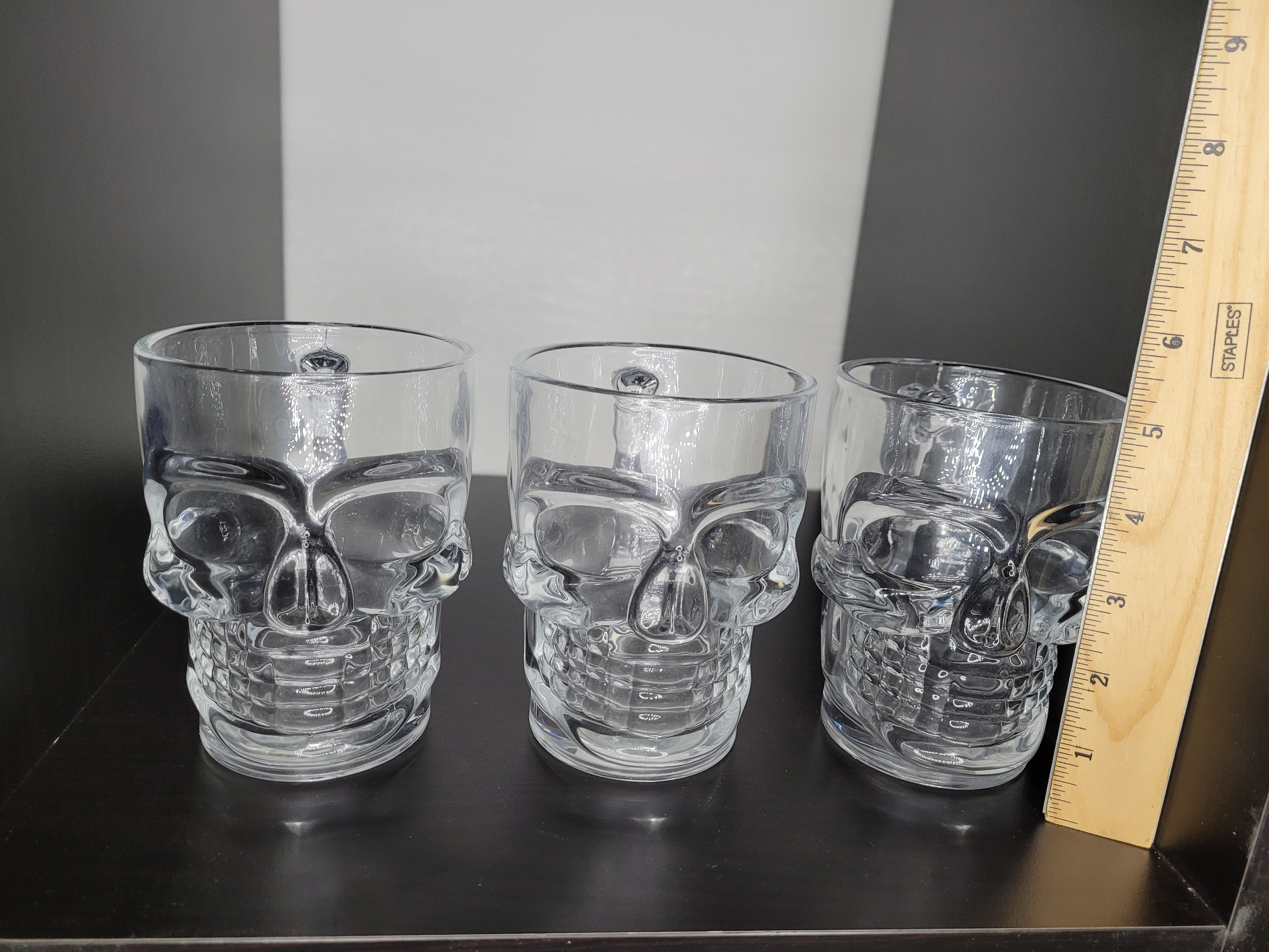 Set of 3 glass skull mugs