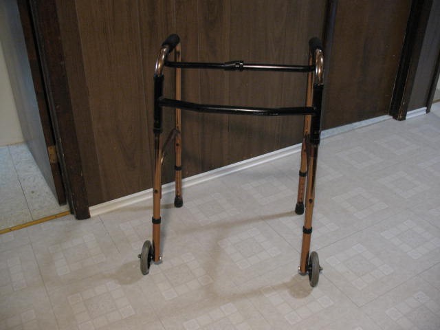 Brass Colored Adjustable Walker with 2 Front Wheels