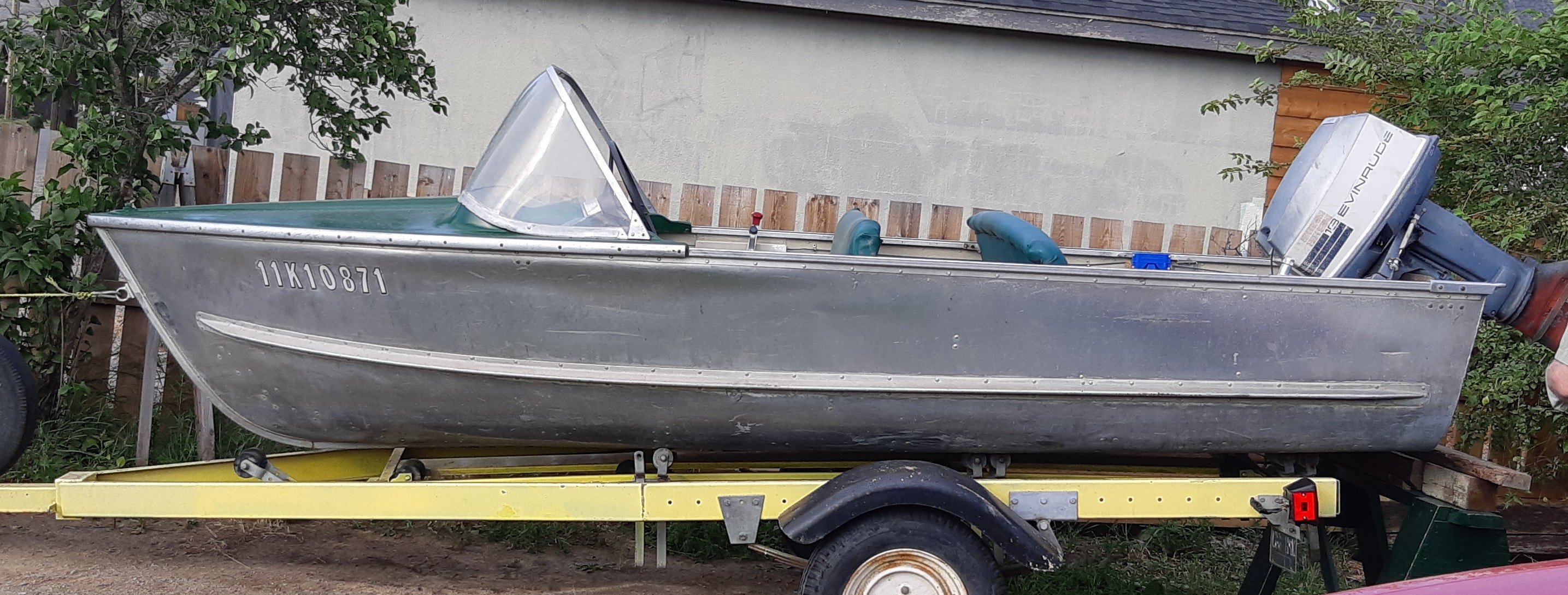 12 Ft aluminum boat, motor, tilt trailer & cover