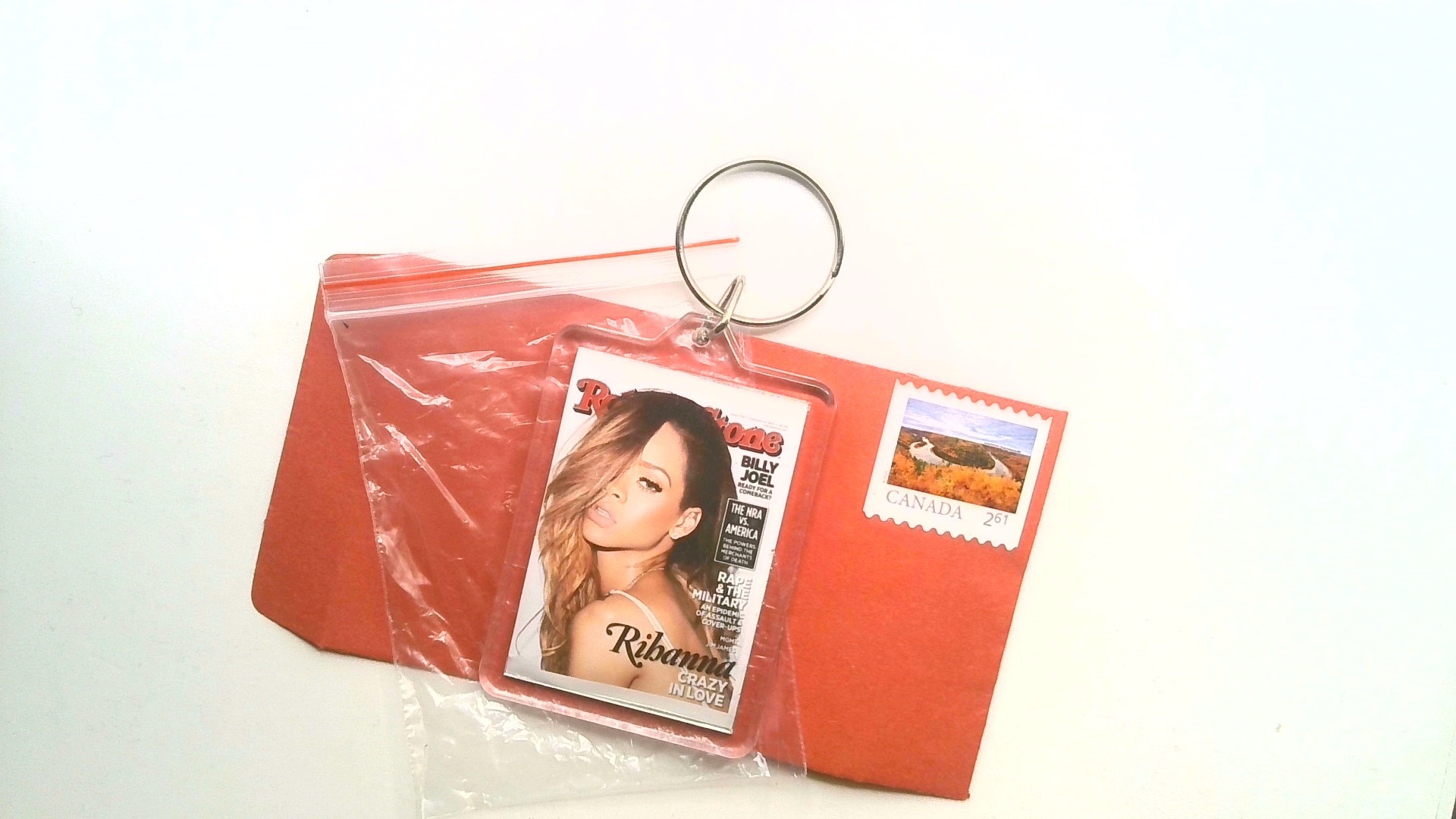 RHIANNA ( ROLLING STONE MAGAZINE KEY CHAIN ) FREE SHIPPING