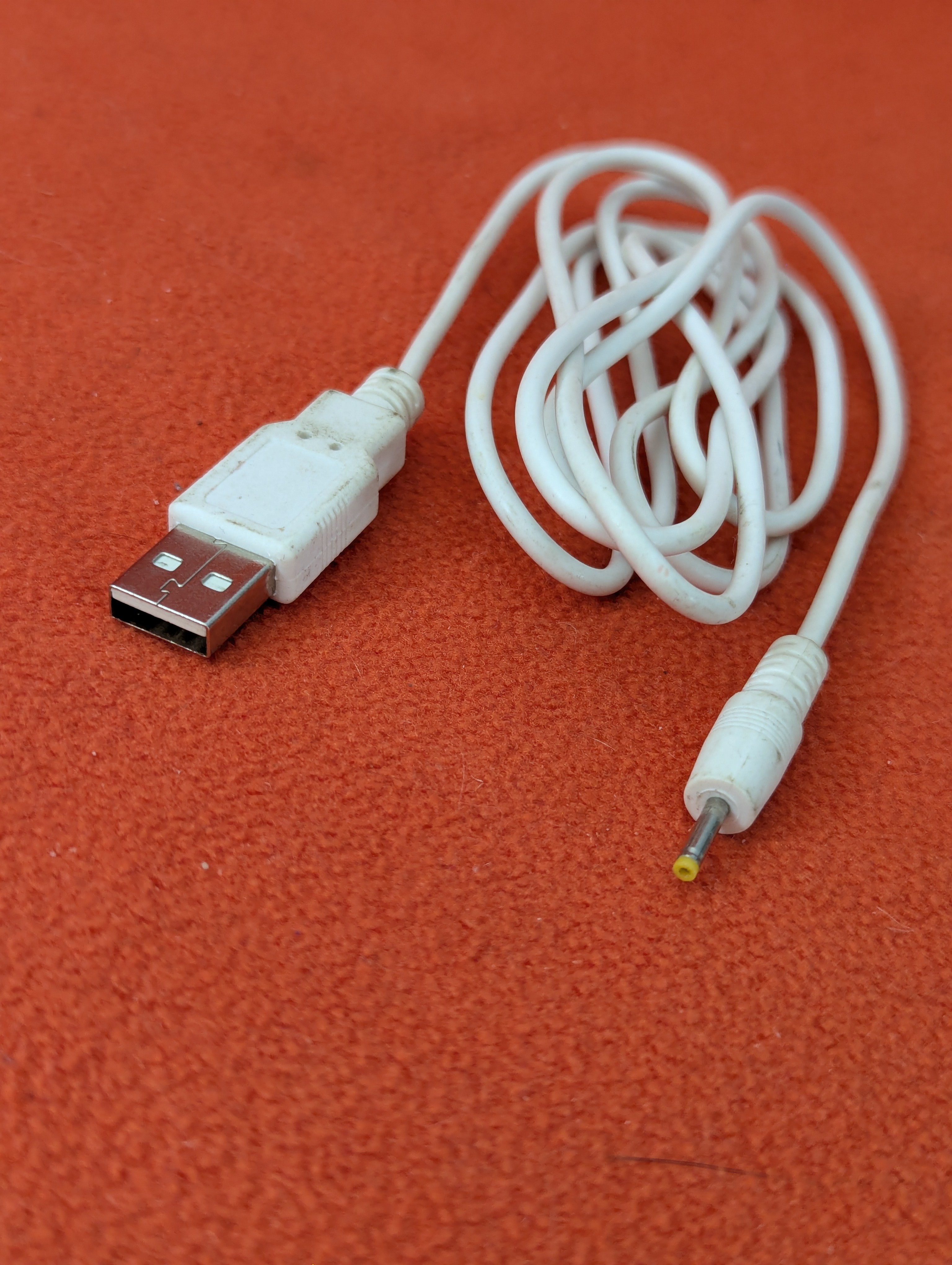 About 5-ft Type A USB to male yellow-tipped DC power jack cable