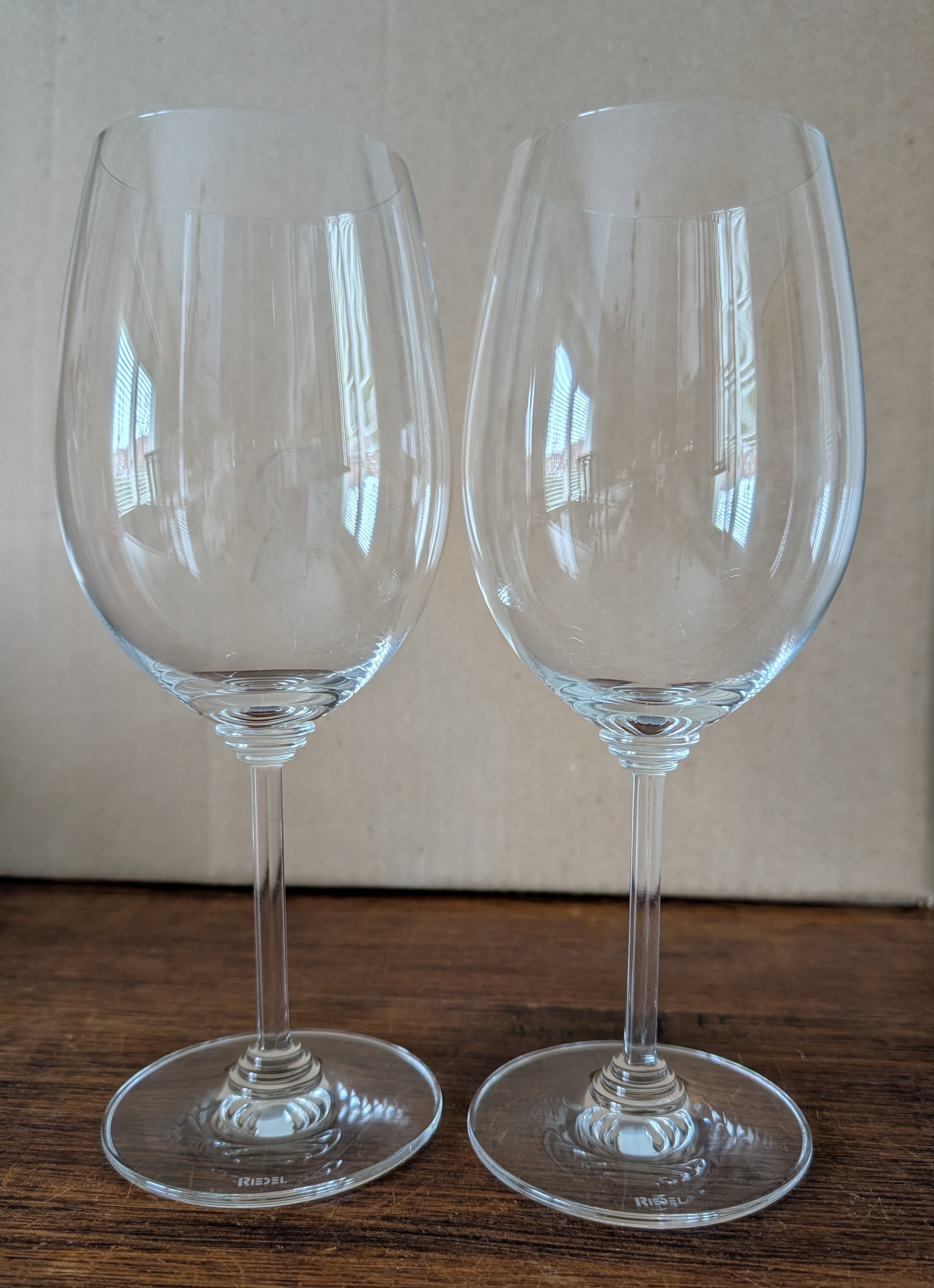 2 Riedel stemmed crystal wine glasses