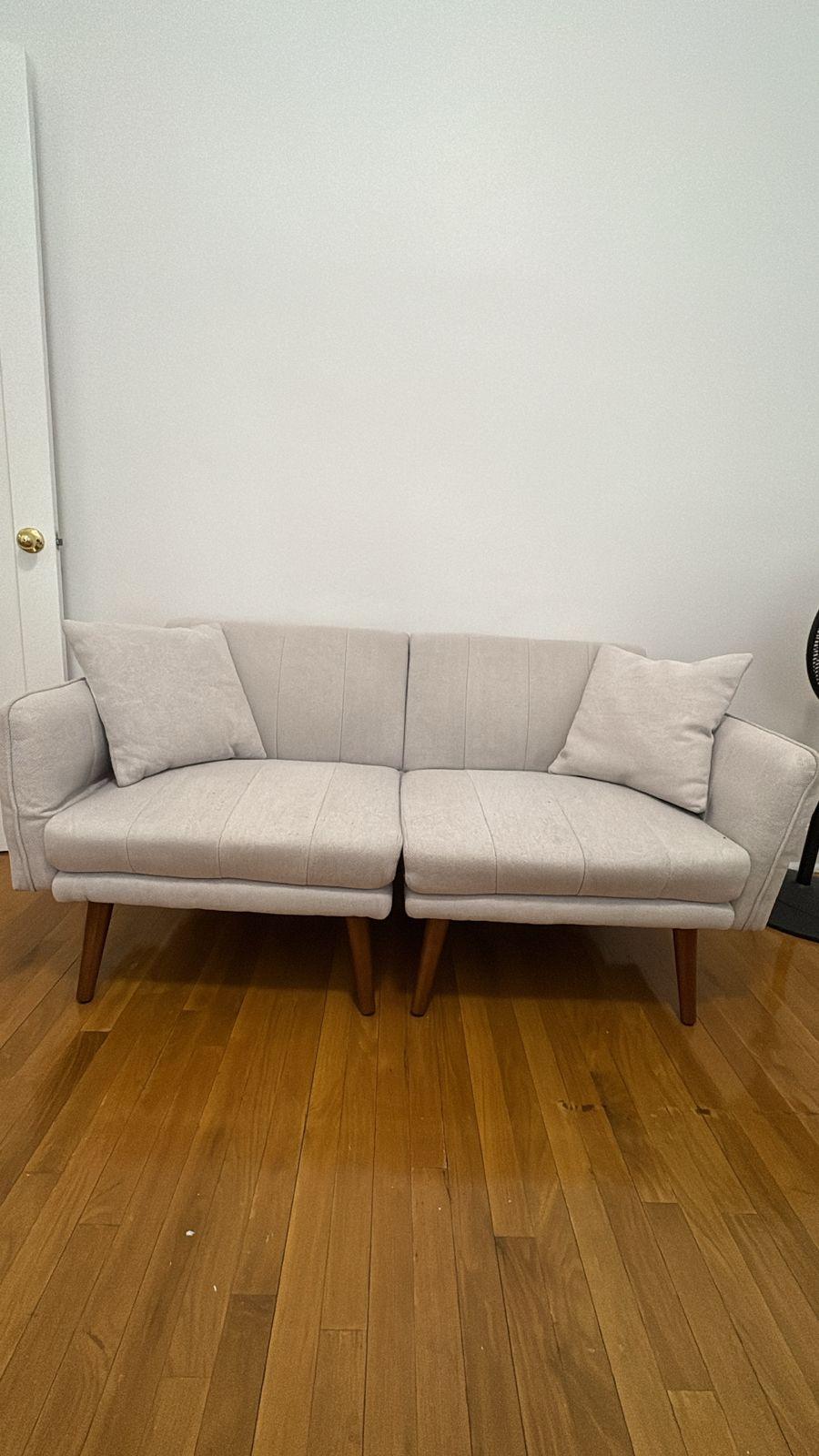 Light Beige Sofa with 2 Pillows (becomes flatbed)