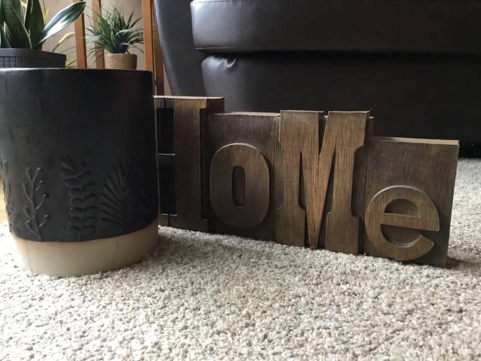 House hold items wooden home sign and utensil holder