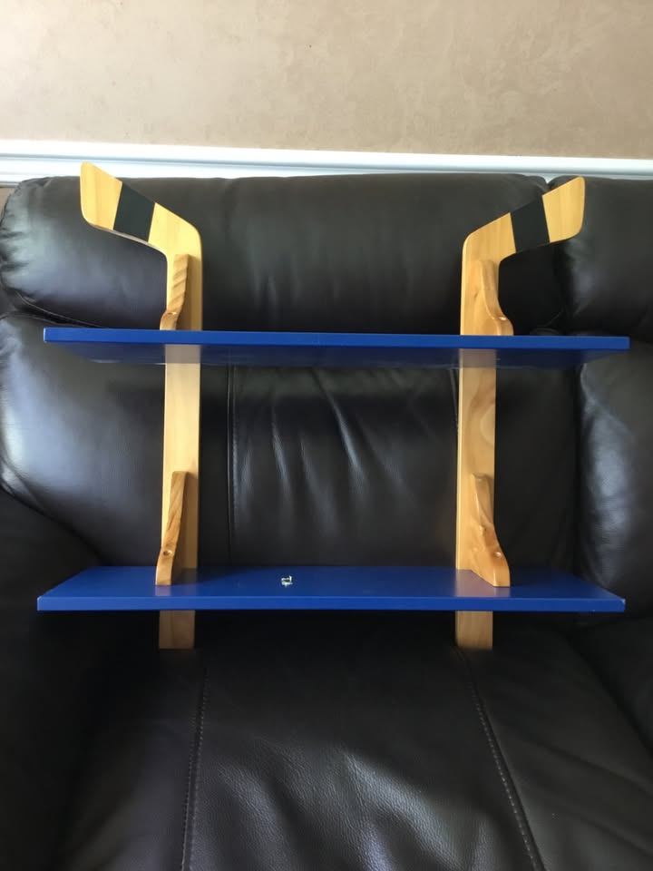 Kids hockey stick shelf