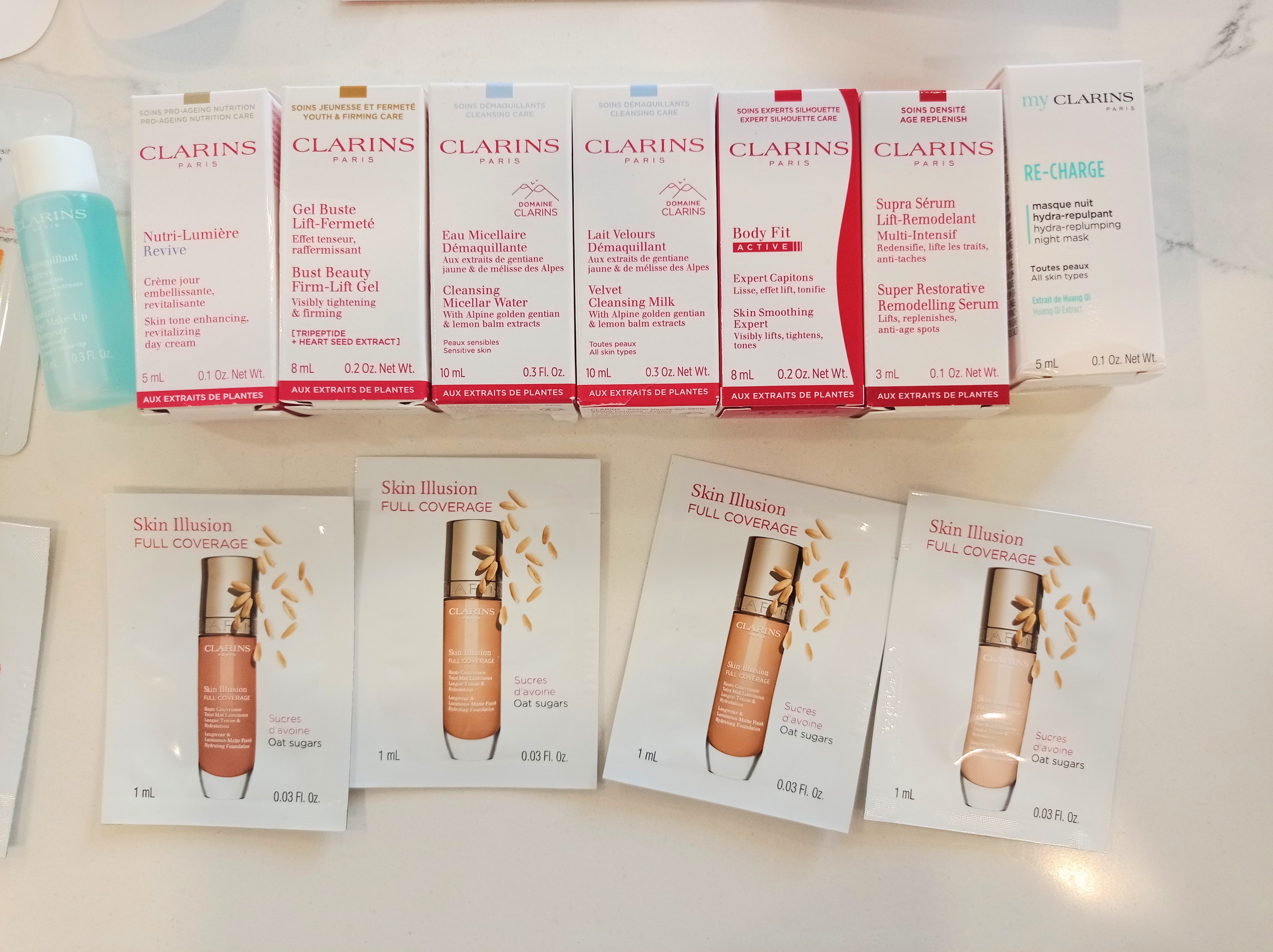 Huge Clarins Luxury Beauty Sample Bundle + Tie-Dye Tote Bag - photo 2