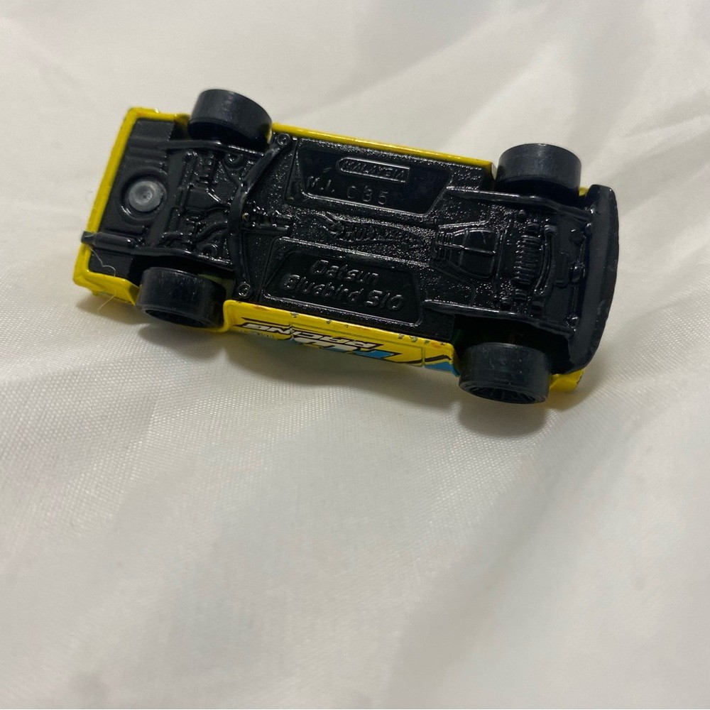 Hot Wheels 2011 Nightburnerz 9/10 Datsun Bluebird 510 in Yellow