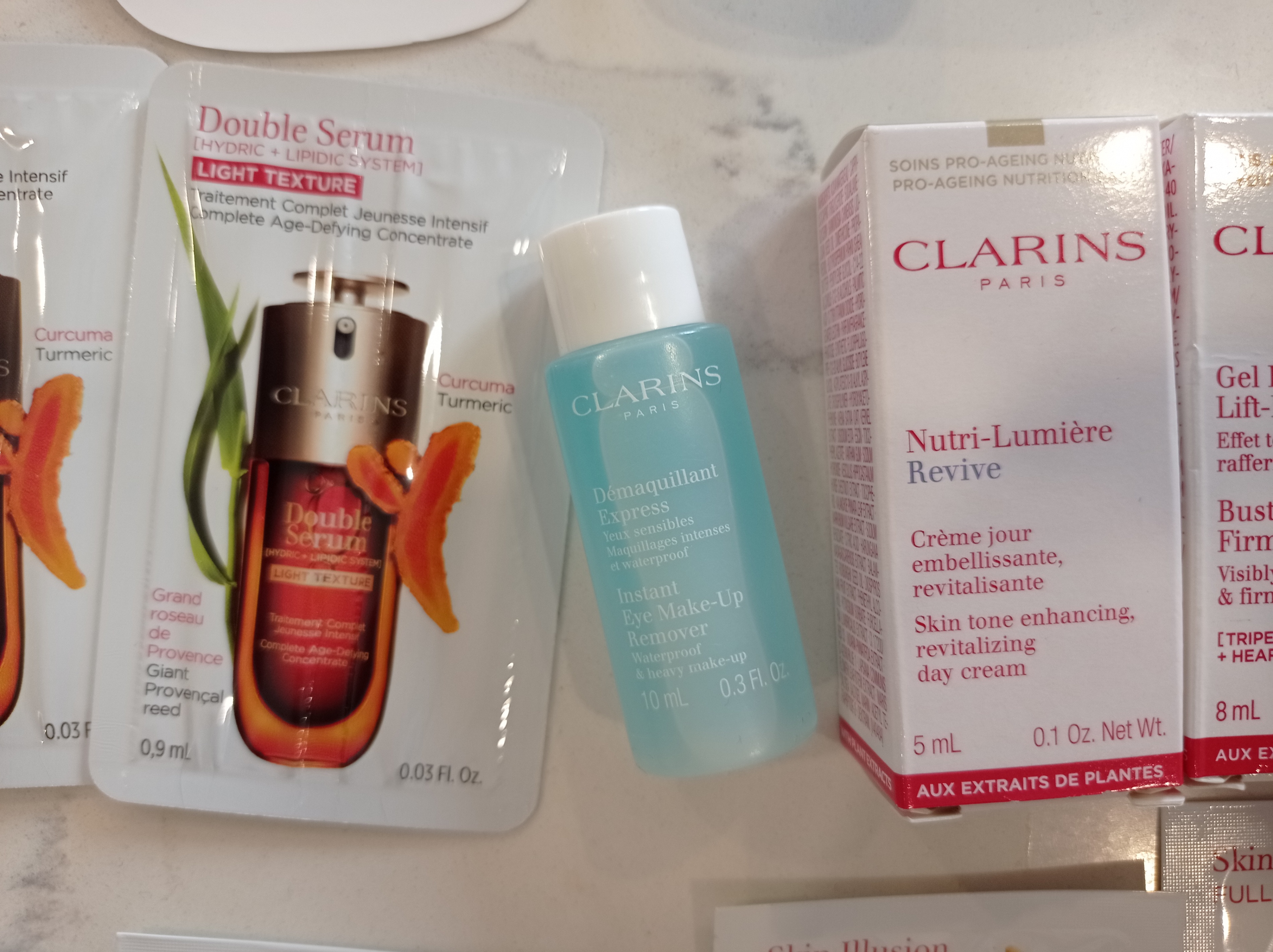 Huge Clarins Luxury Beauty Sample Bundle + Tie-Dye Tote Bag - photo 4