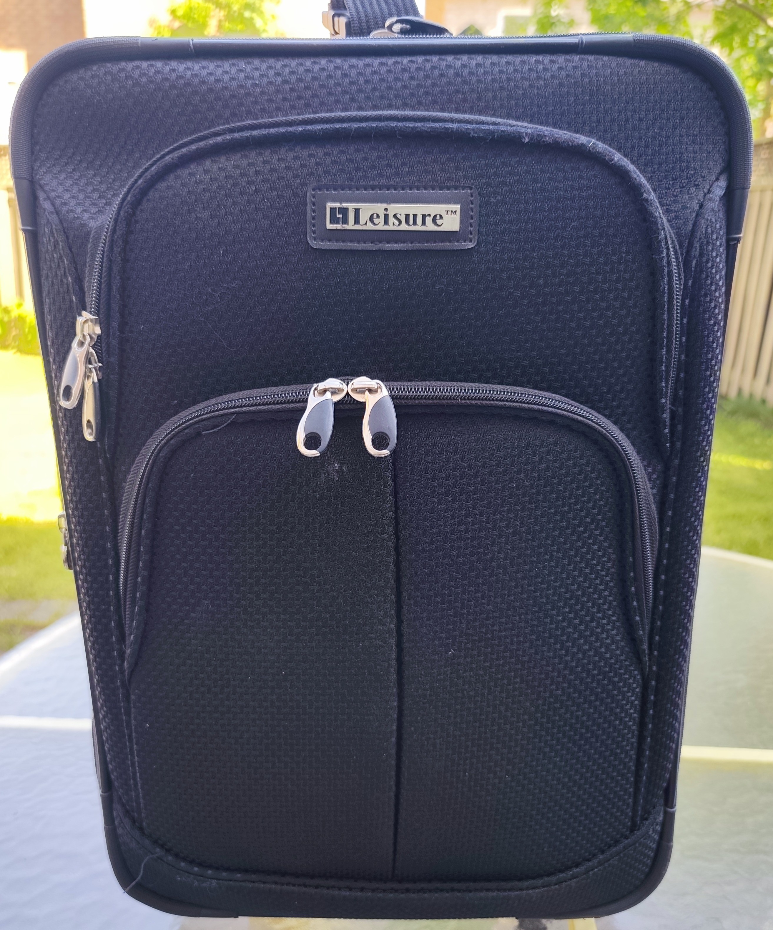 Carry on luggage with telescopic pull handle
