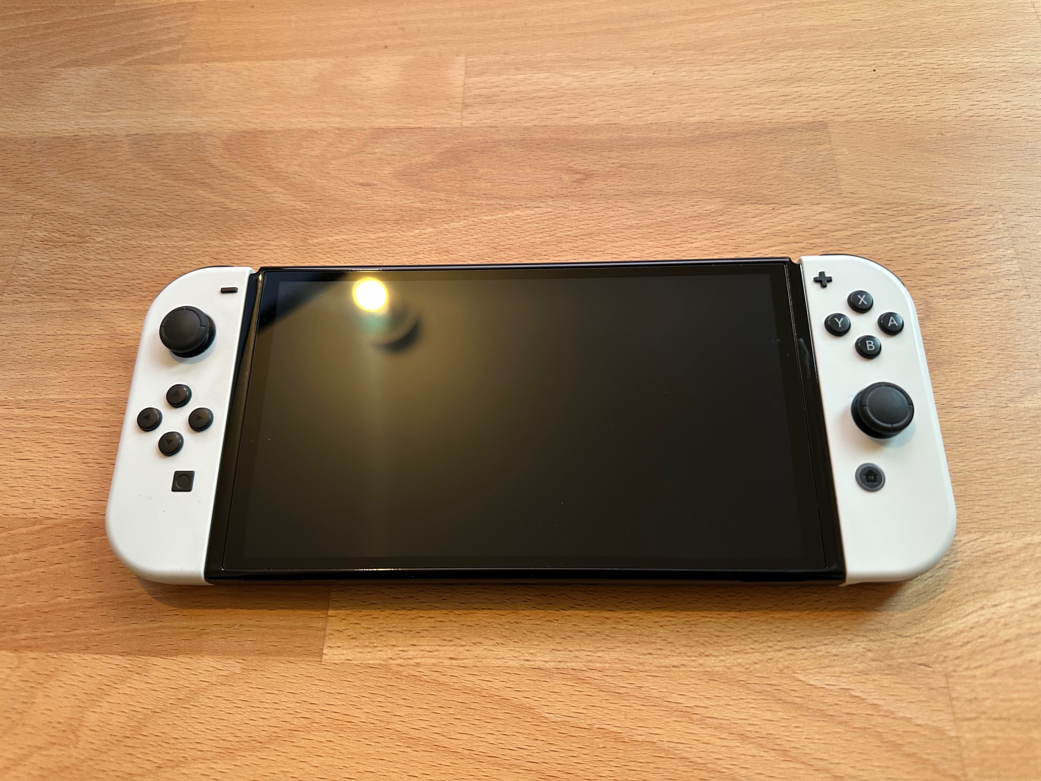 Nintendo Switch OLED White Bundle – 4 Joy-Cons, 3 Games, 2 Cases