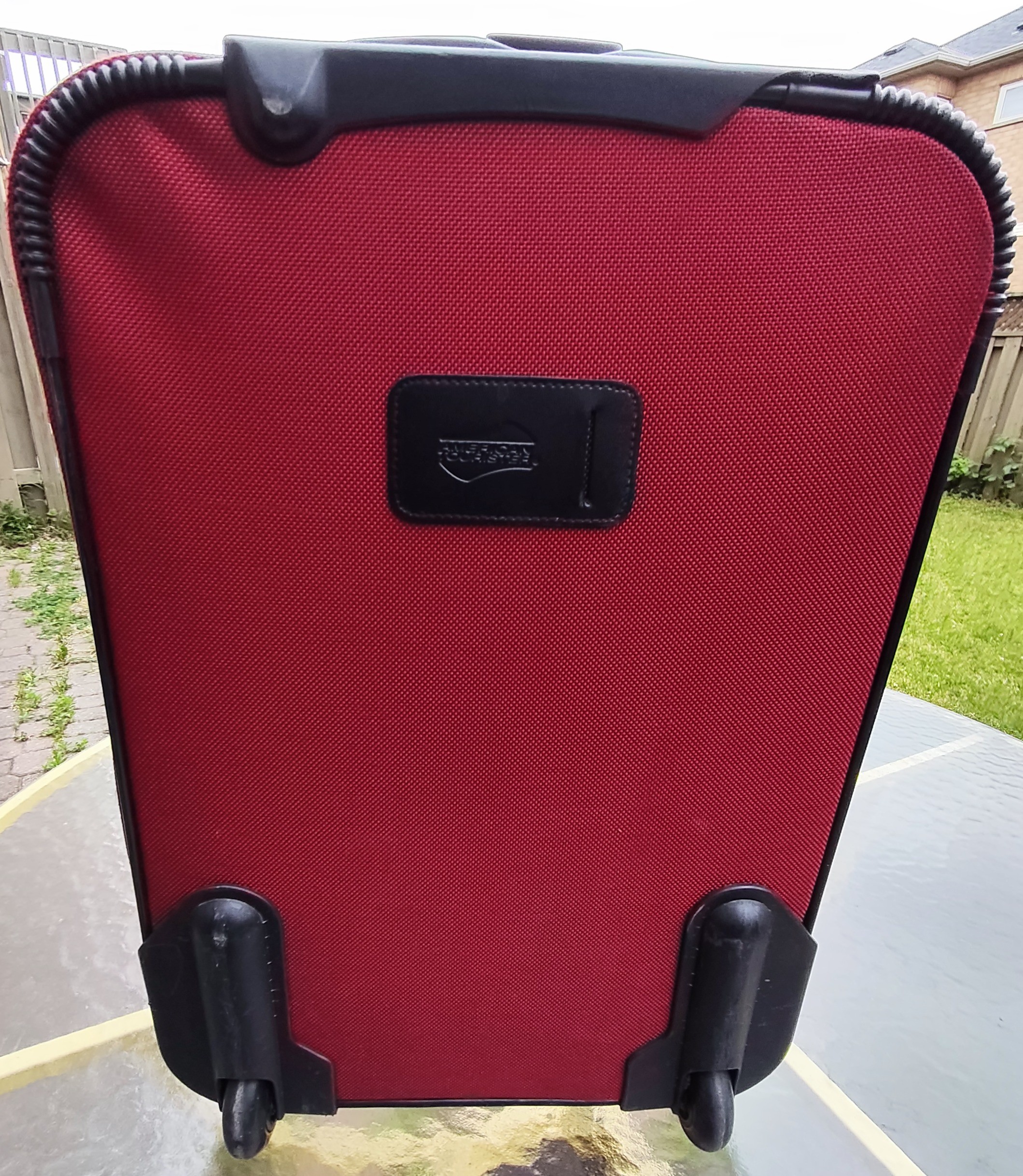American Tourister carry on luggage with telescopic pull handle - photo 4
