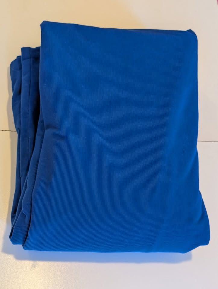 Large bunch of fabric in a polyester corduroy