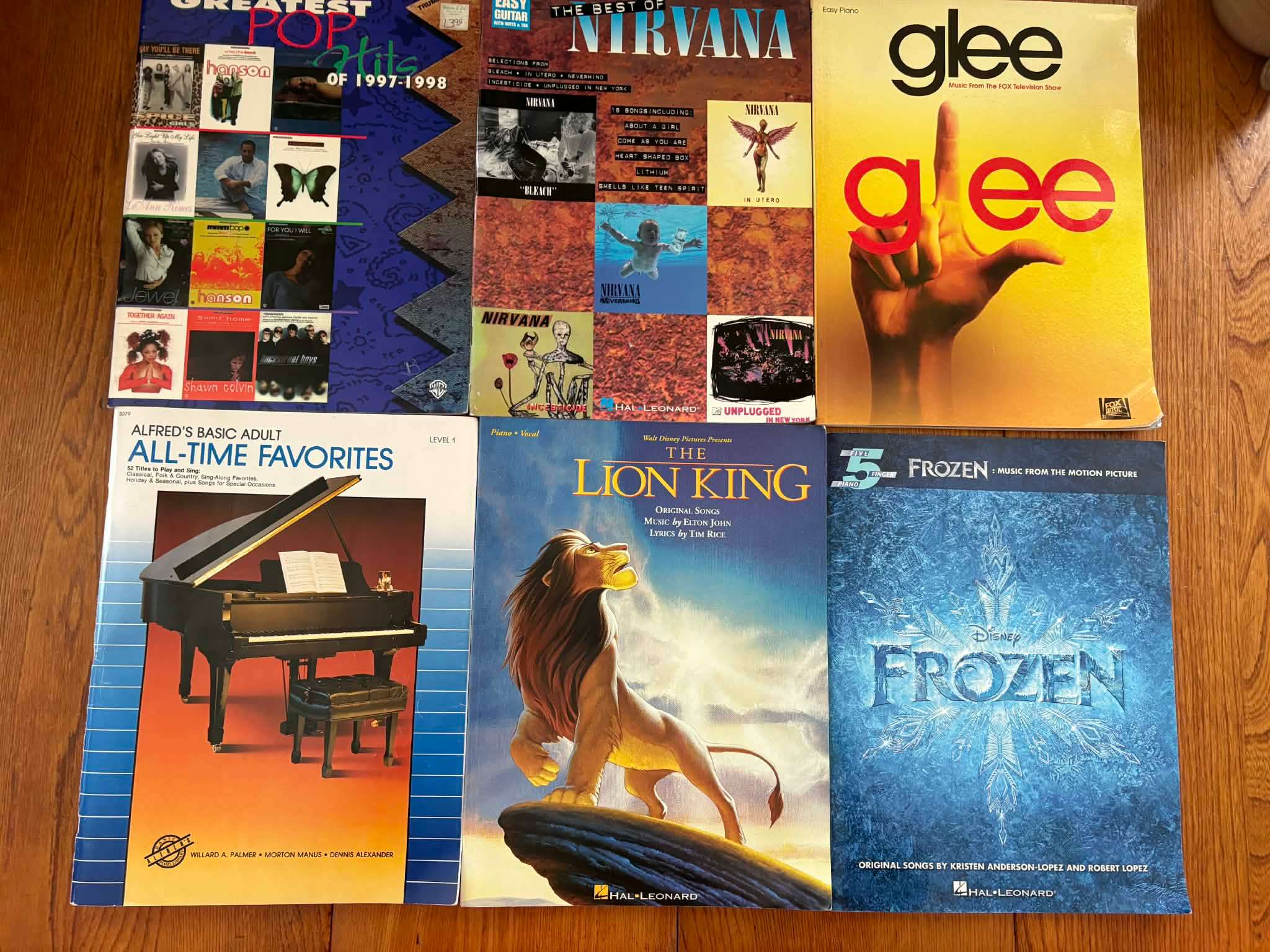 Variety of piano books - Frozen, Glee, Lion King and more