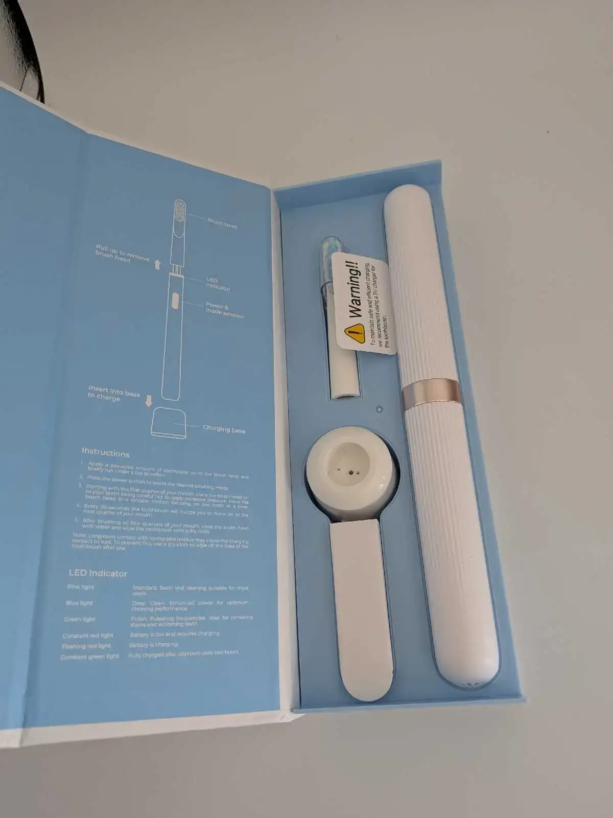 Electric Toothbrush with Charging Base